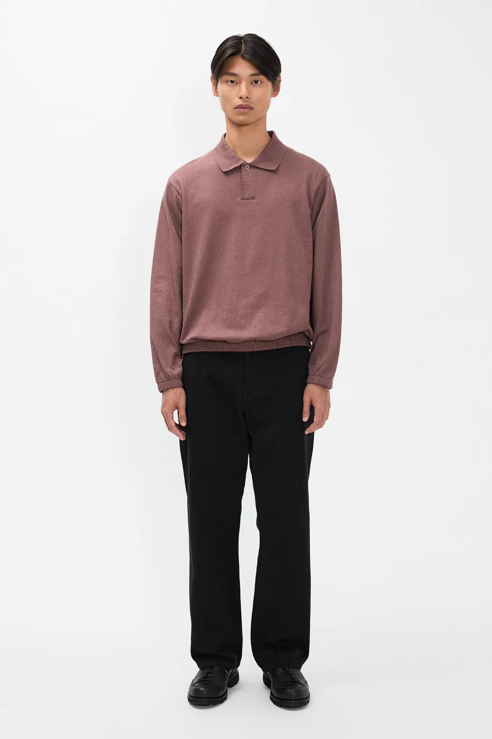 Back view model wearing Norse Projects Korshavn black relaxed pants