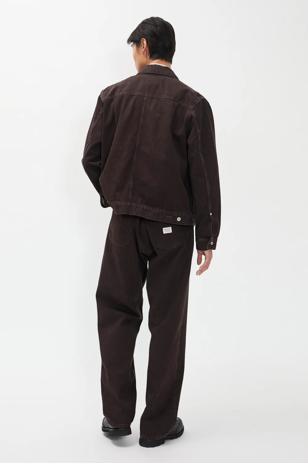 Back view model wearing Norse Projects Korshavn shale relaxed pants