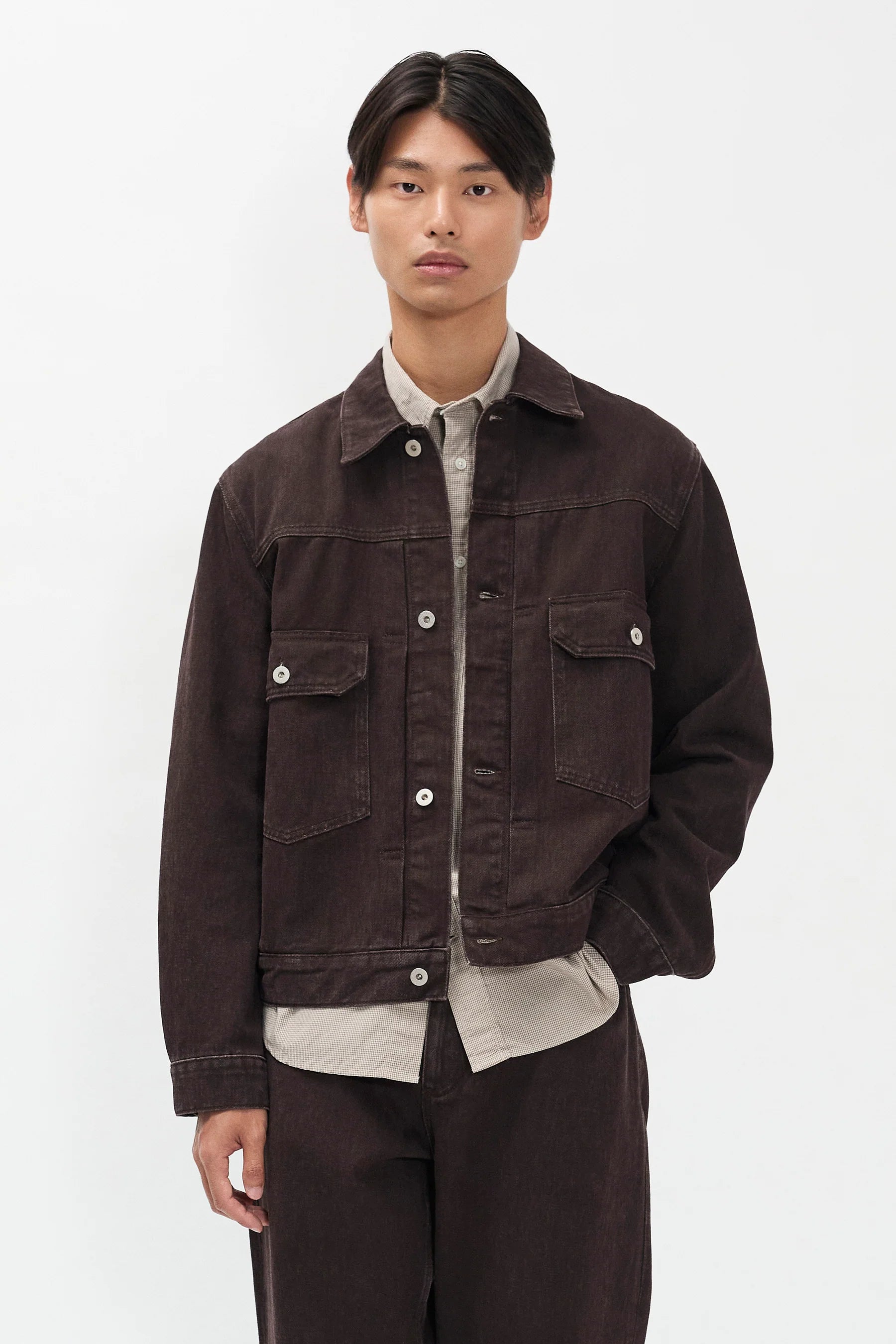 Model wearing Norse Projects Storadal resist dyed twill Type II jacket shale