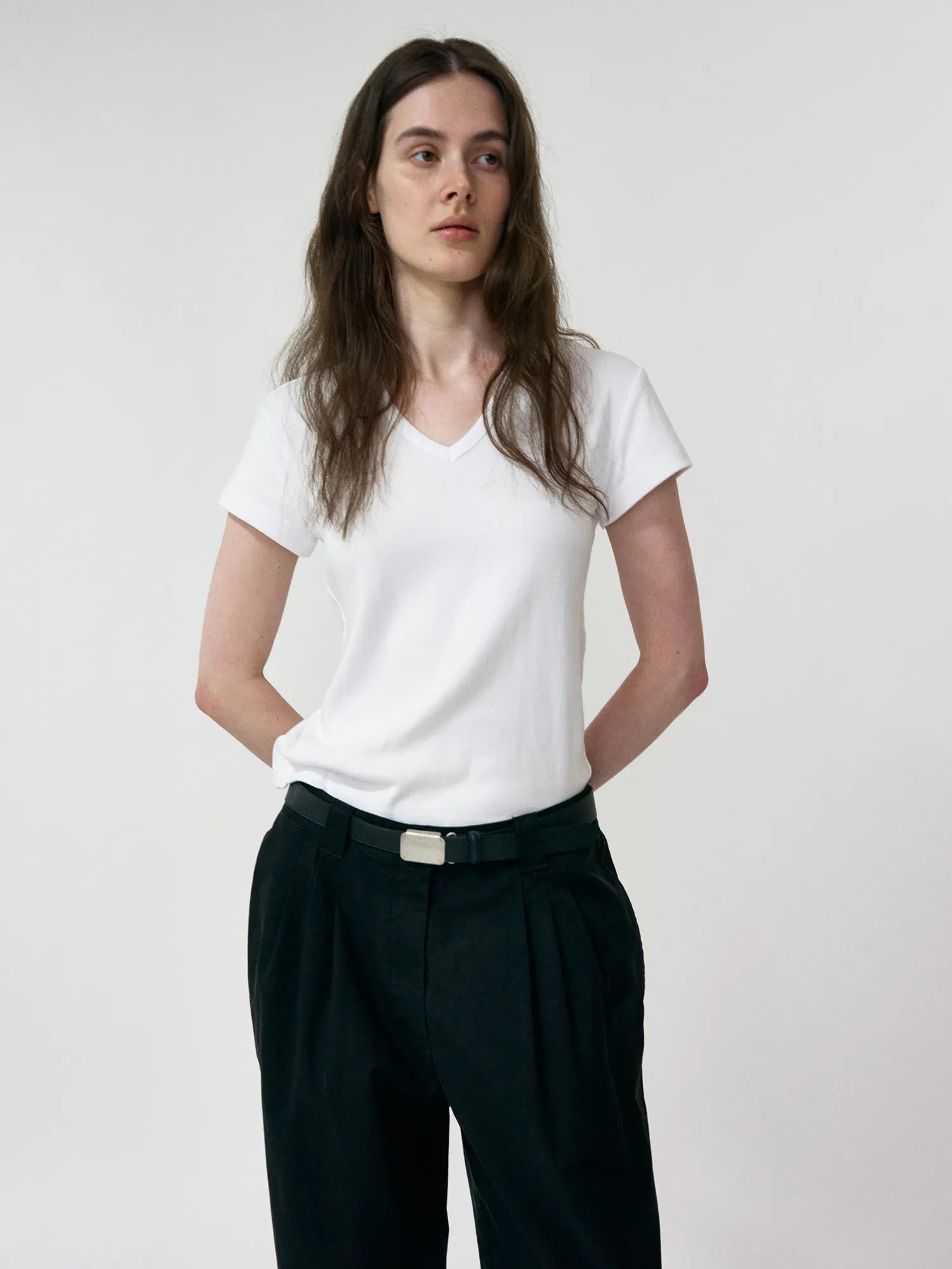 Model wearing NOTHING WRITTEN 90s V-Neck T-Shirt in White