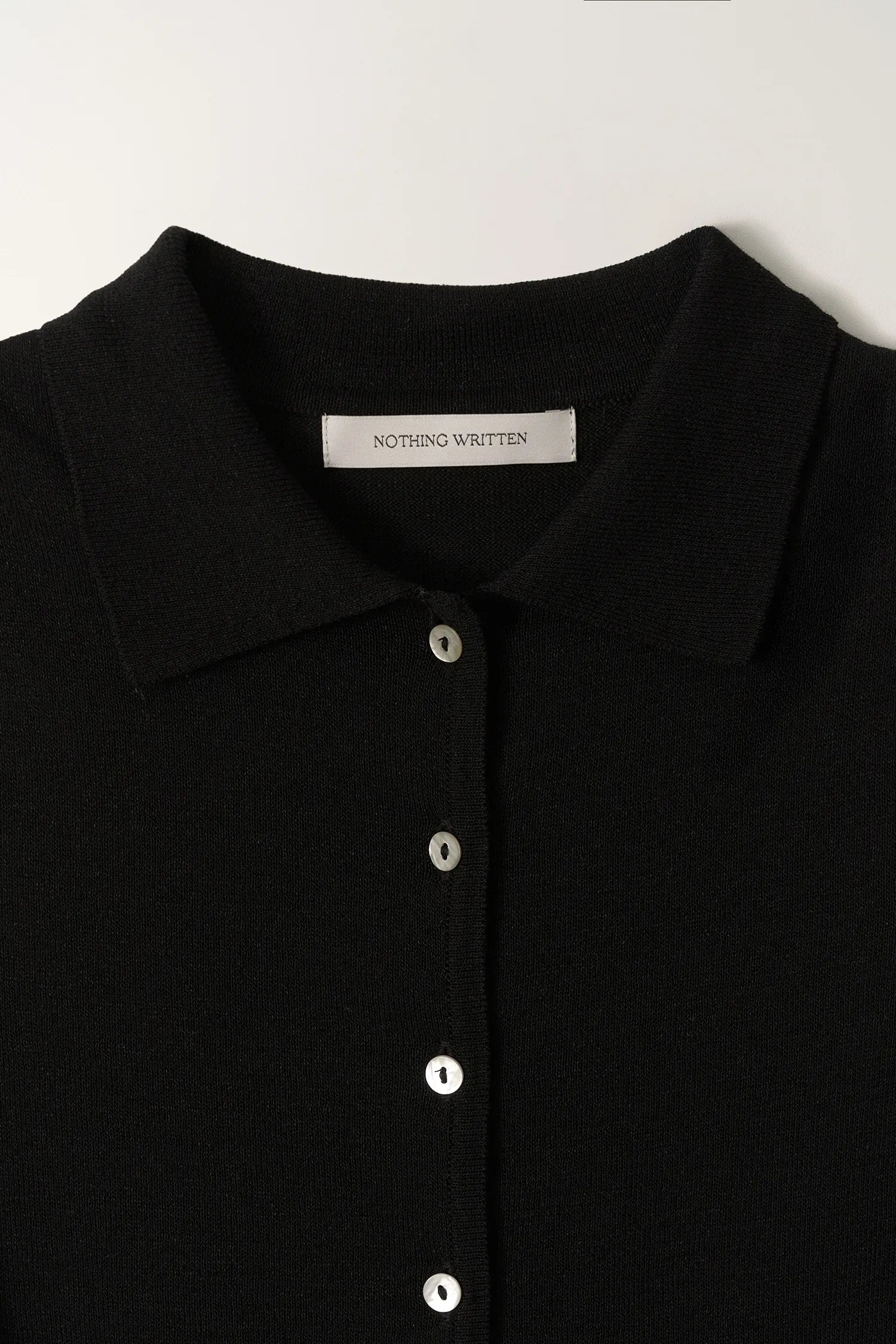 Nothing Written Lash Sleeveless Knit Top Black collar button detail