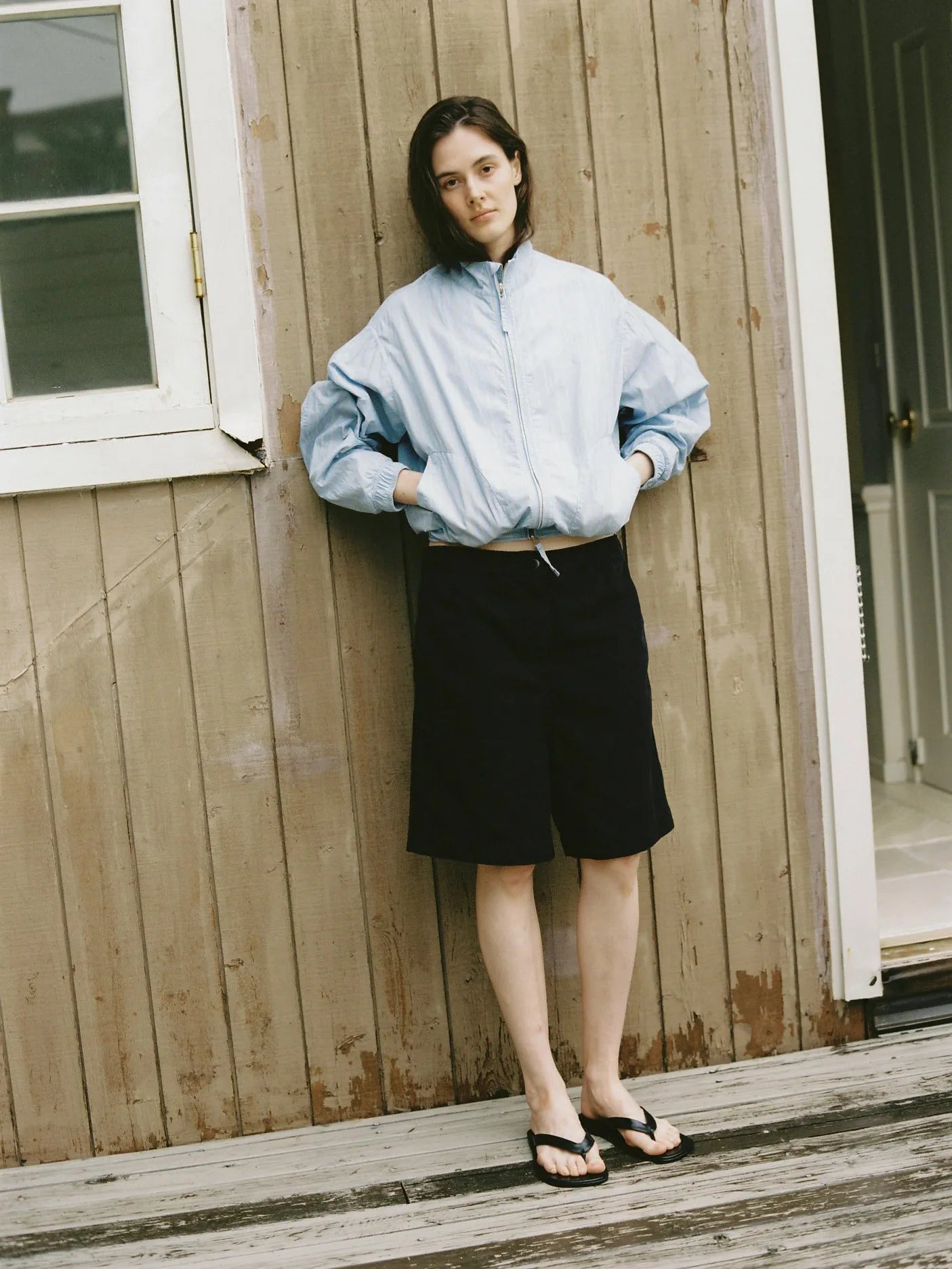 Lifestyle styling of NOTHING WRITTEN Panny Harrington Jacket in Blue Stripe