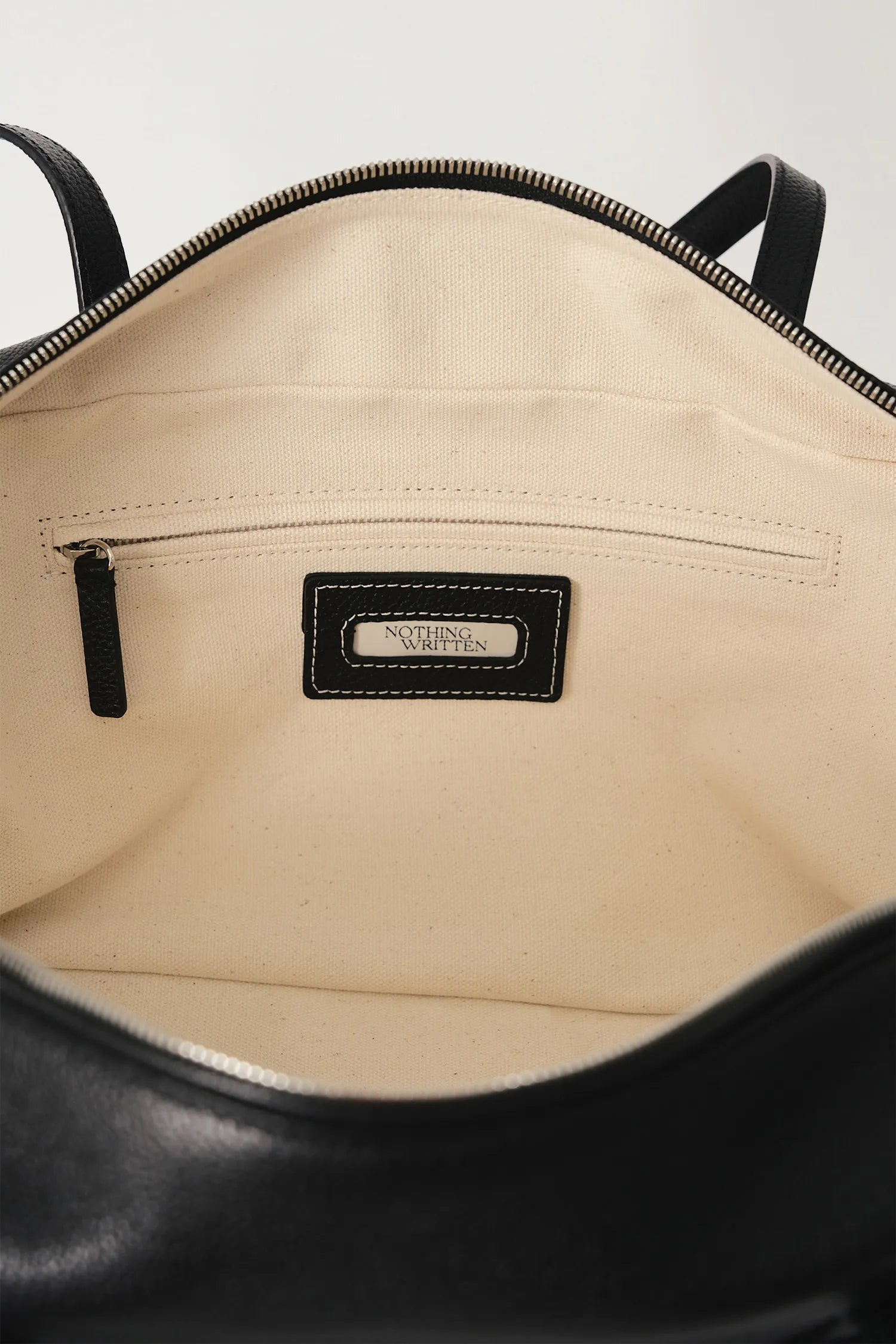 Nothing Written Pocket Shoulder Bag Black interior detail