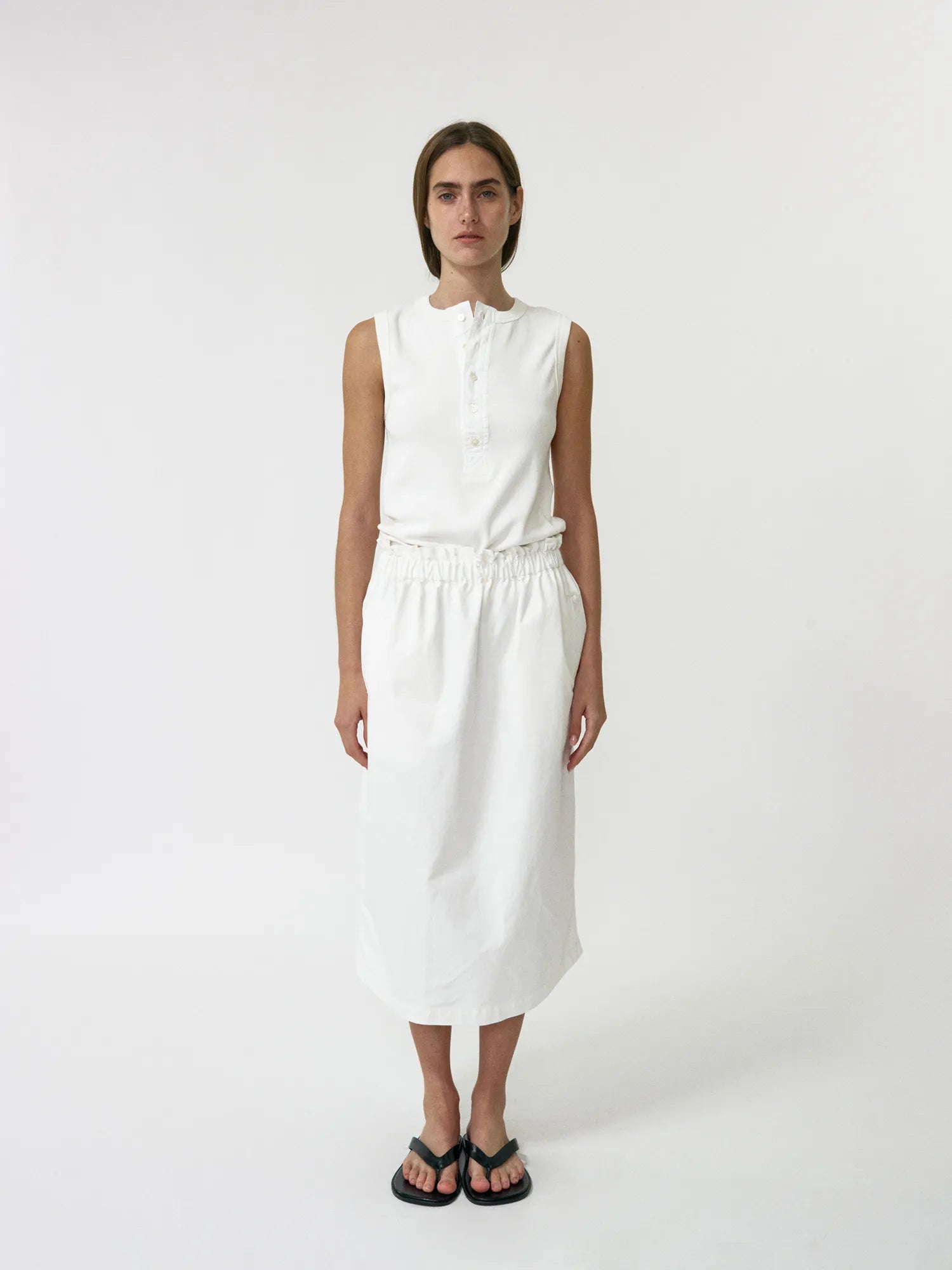 Model wearing NOTHING WRITTEN Shirring Band Cotton Skirt in White