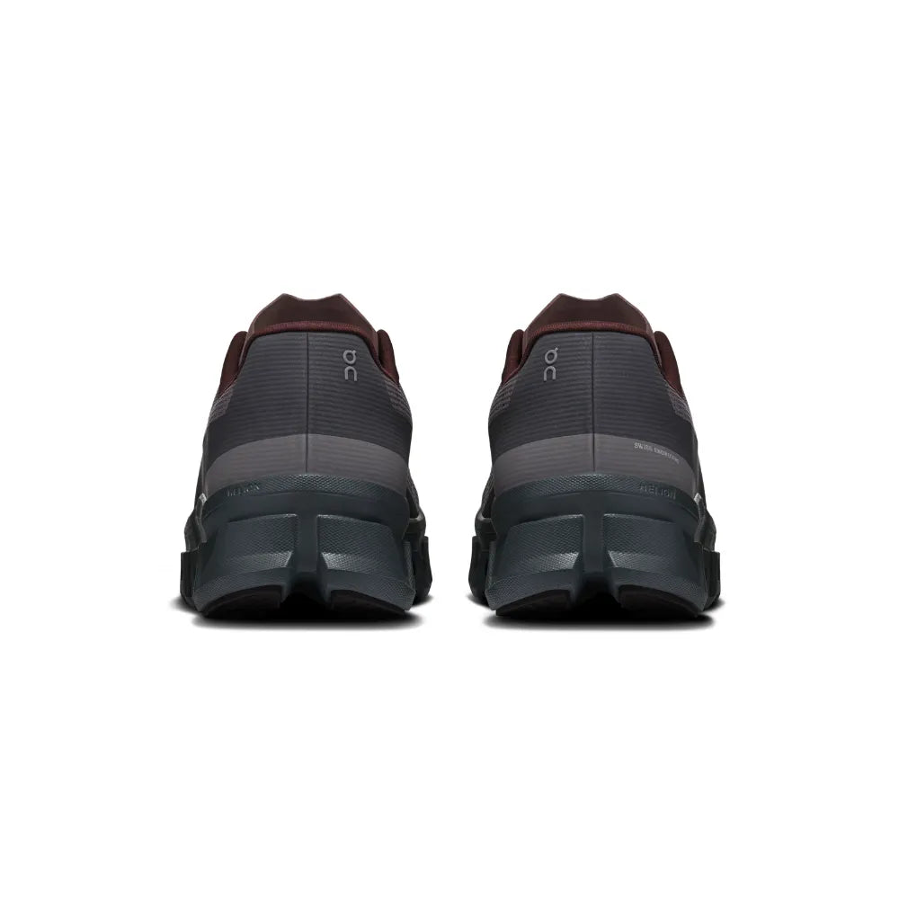 Rear view of On Cloudmonster Void Men's Ember Ox
