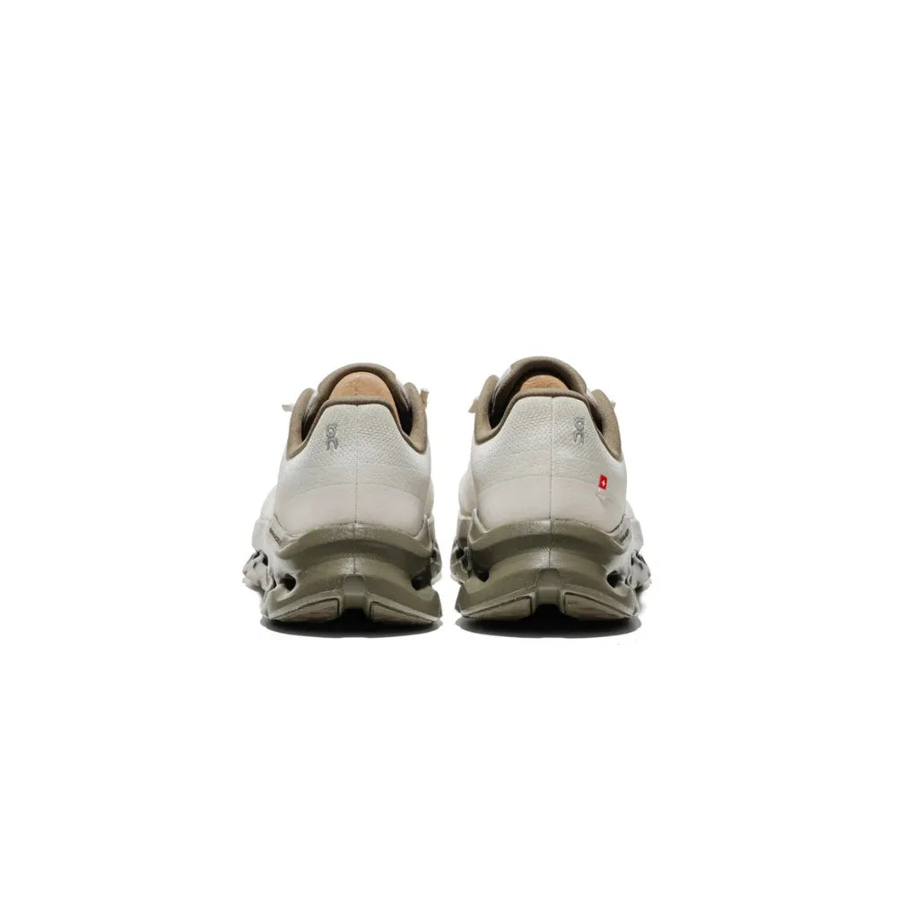 Rear view of On Cloudtilt Men's in Fen Grain