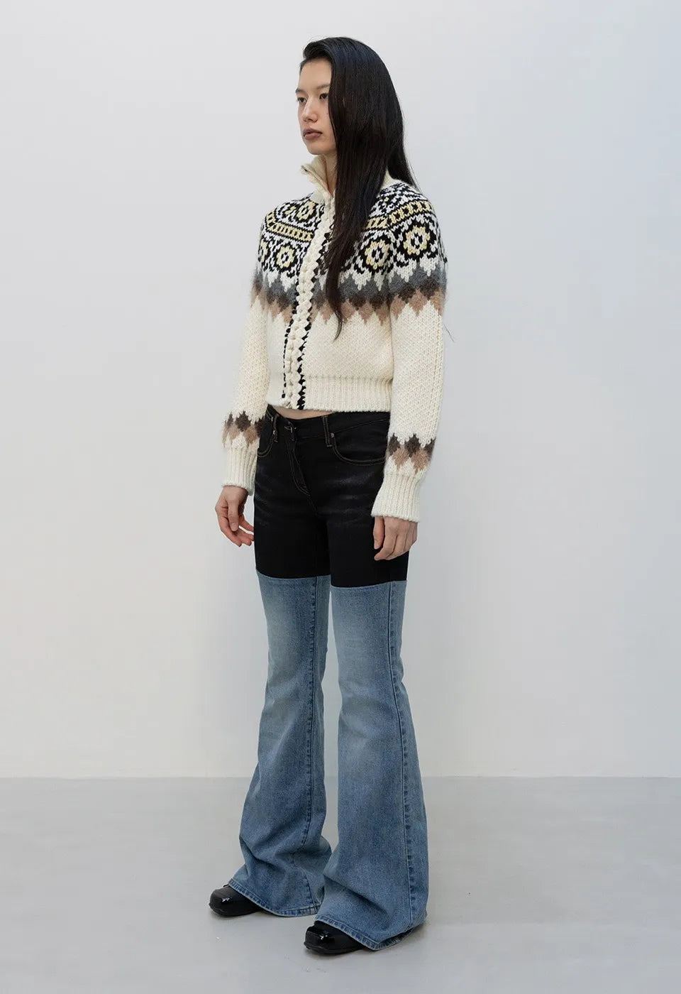 Side view of OPENYY Color Block Bootcut Jeans in Blue worn