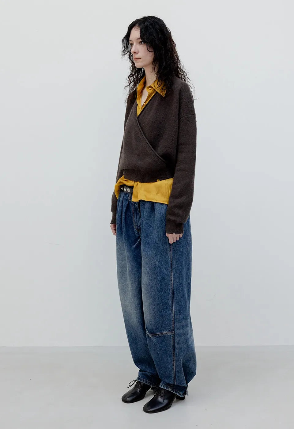Side view of OPENYY Full Gathered Jeans in Blue worn