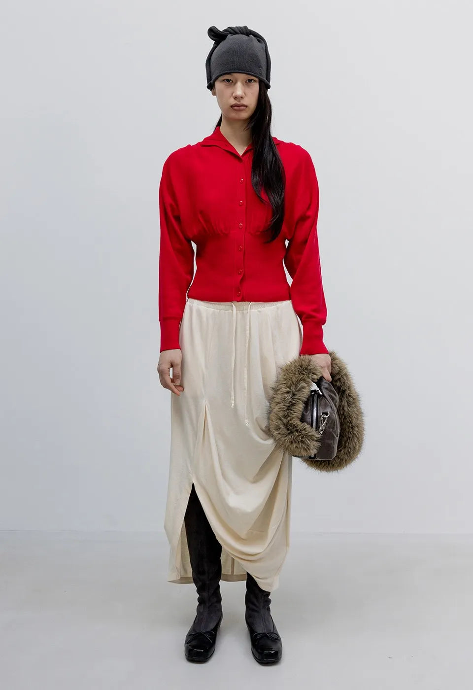 OPENYY Knitted Button Up Blouson Cardigan in Red worn