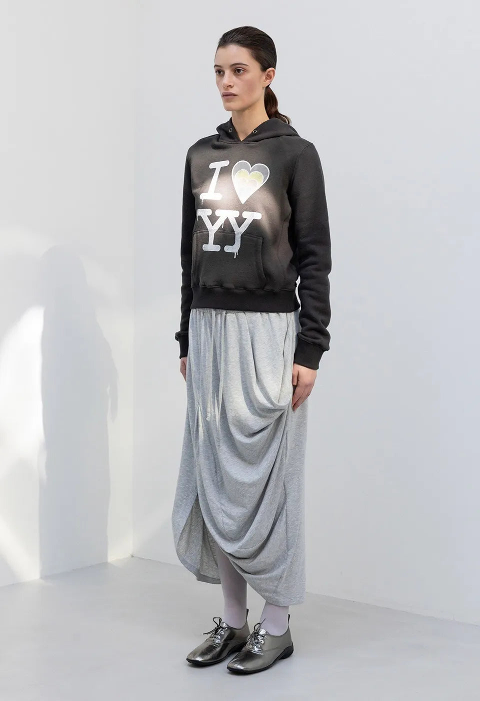 Side view of OPENYY Knitted I Love YY Fit Hoodie in Black worn