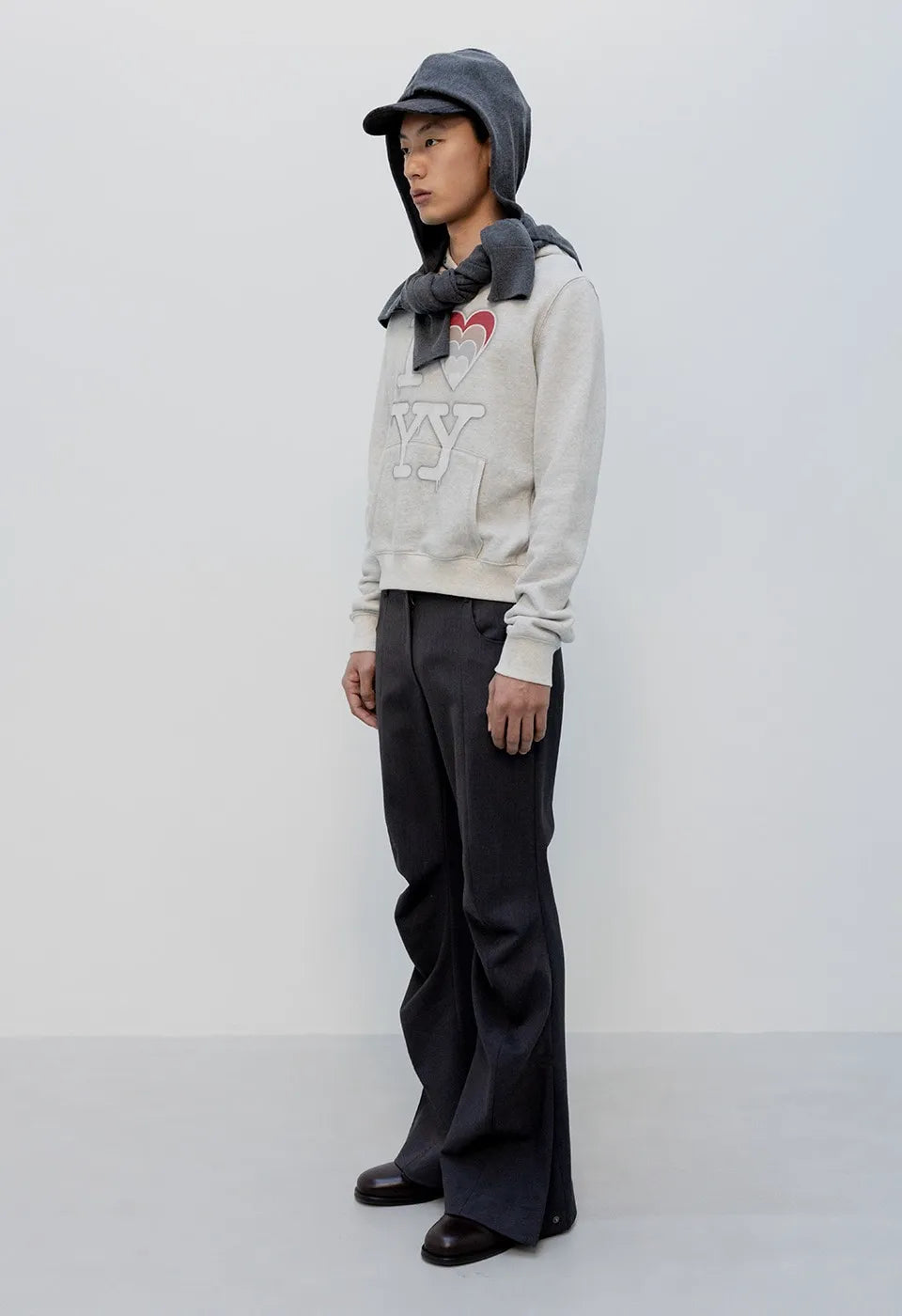 Side view of OPENYY Knitted I Love YY Fit Hoodie in Grey worn