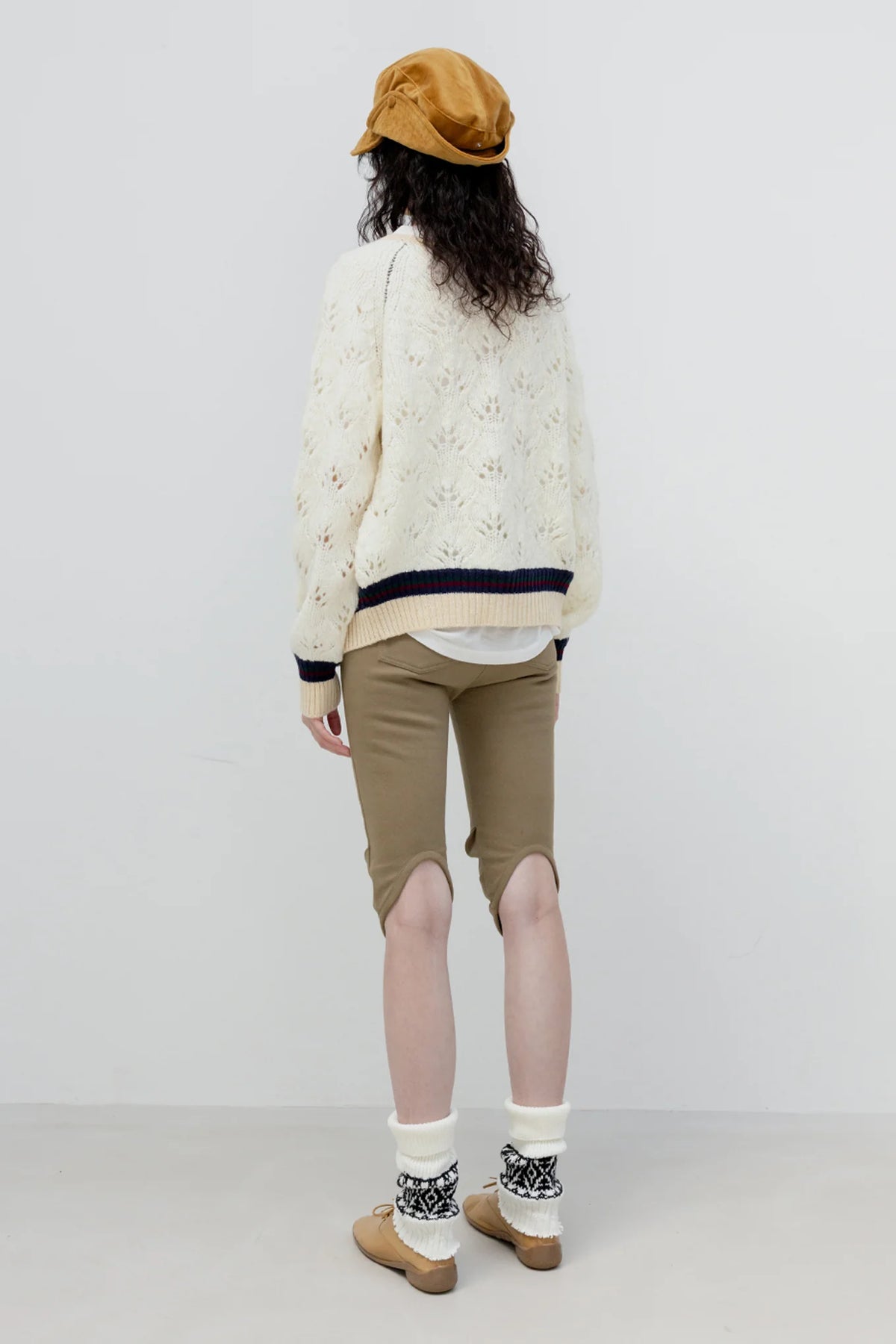 Back view of OPENYY Round Cut Capri Shorts in Khaki Green worn
