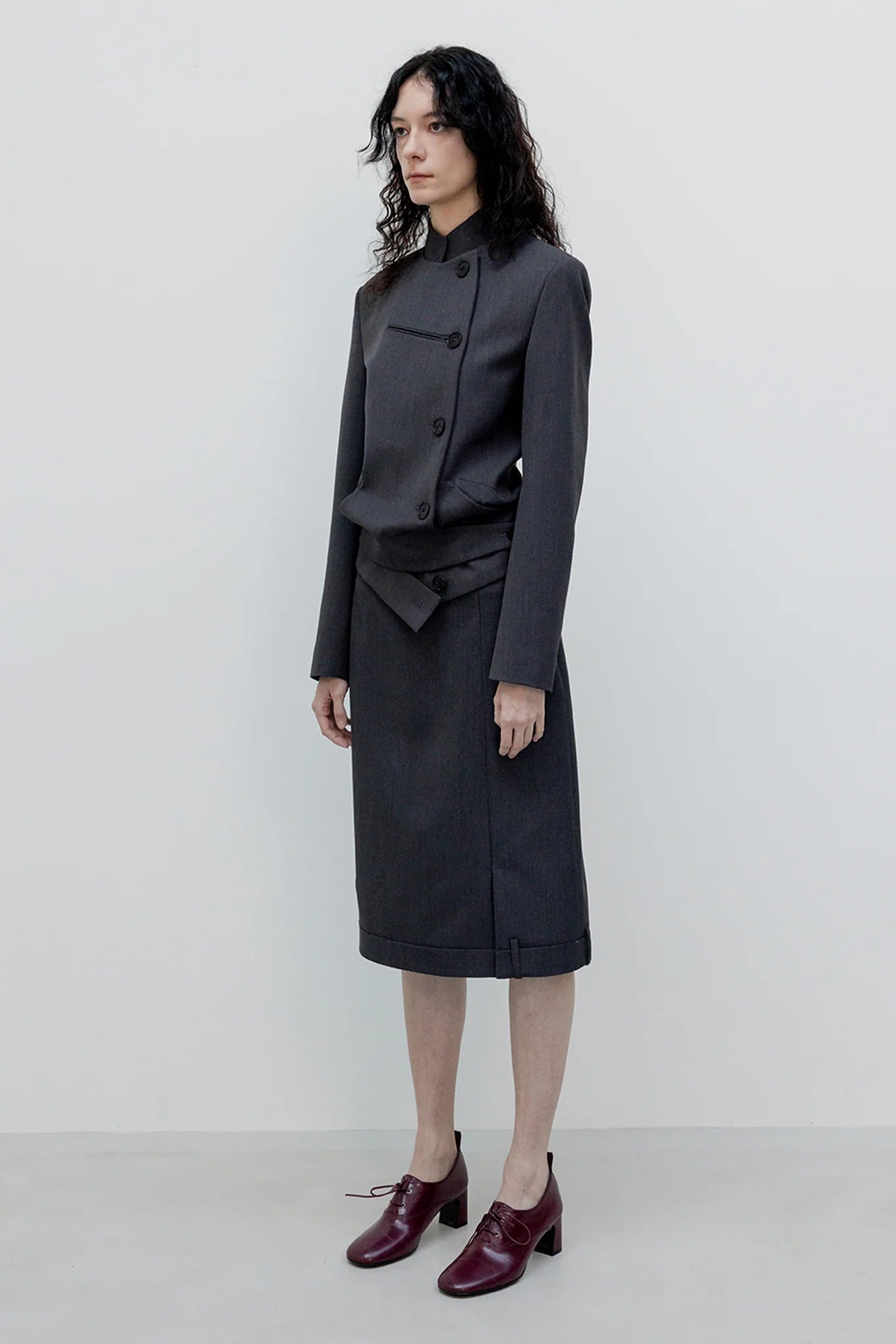 Side view of OPENYY Stripe Double-Breasted Blazer in Black worn