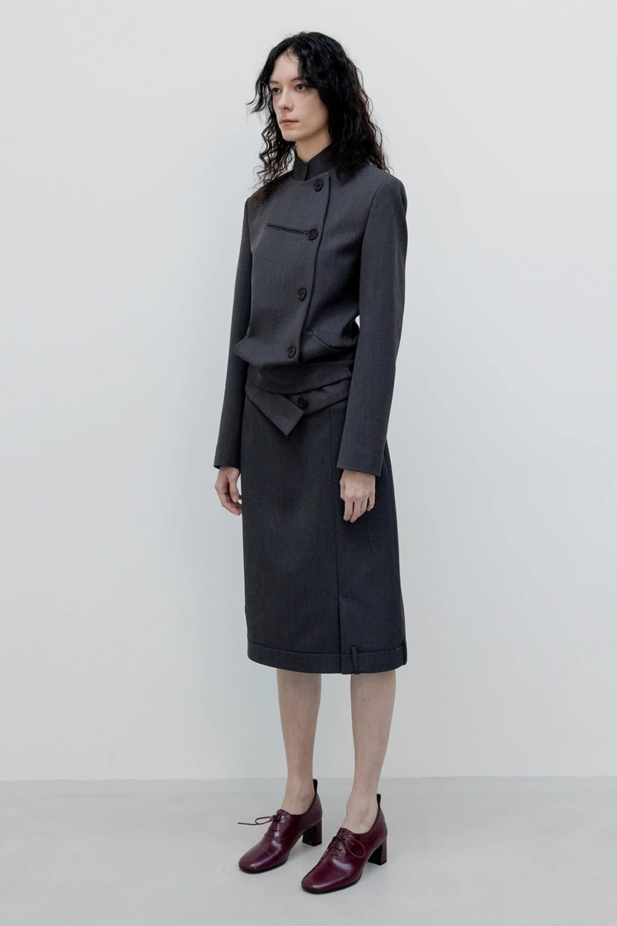 Side view of OPENYY Stripe Double-Breasted Blazer in Black worn