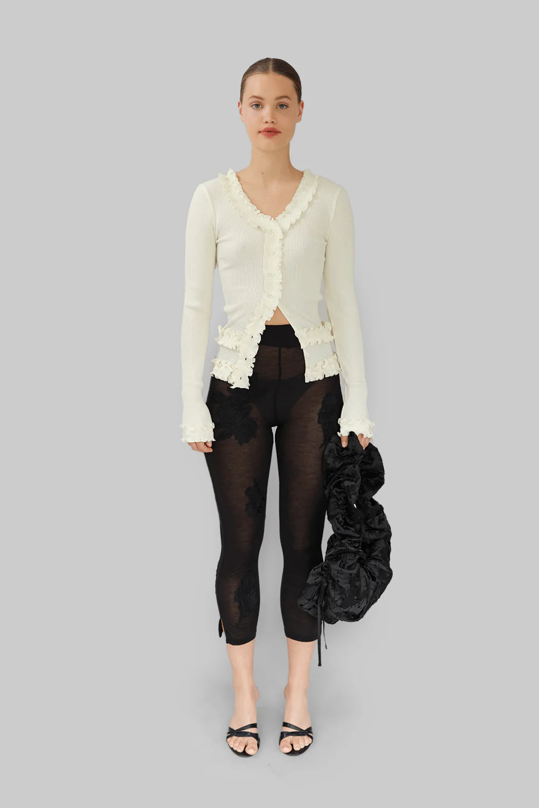 Model wearing OperaSPORT Caroline Seamless Cardigan White front view