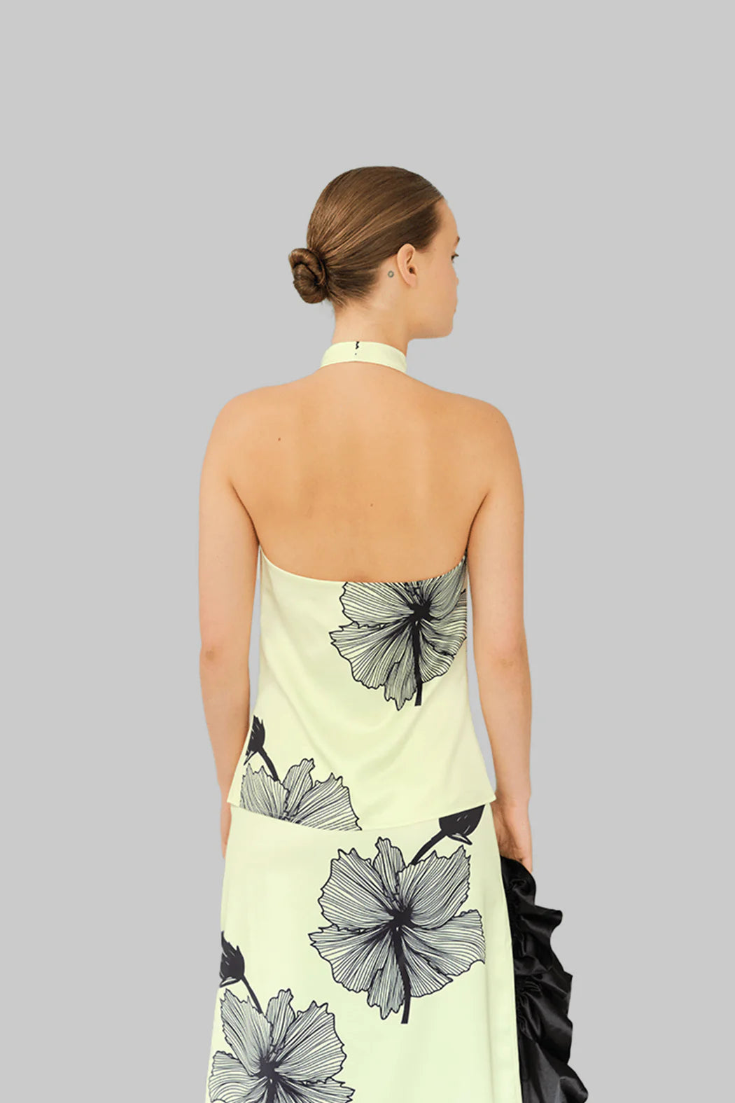 Model wearing OperaSPORT Lone Top Tender Yellow back view