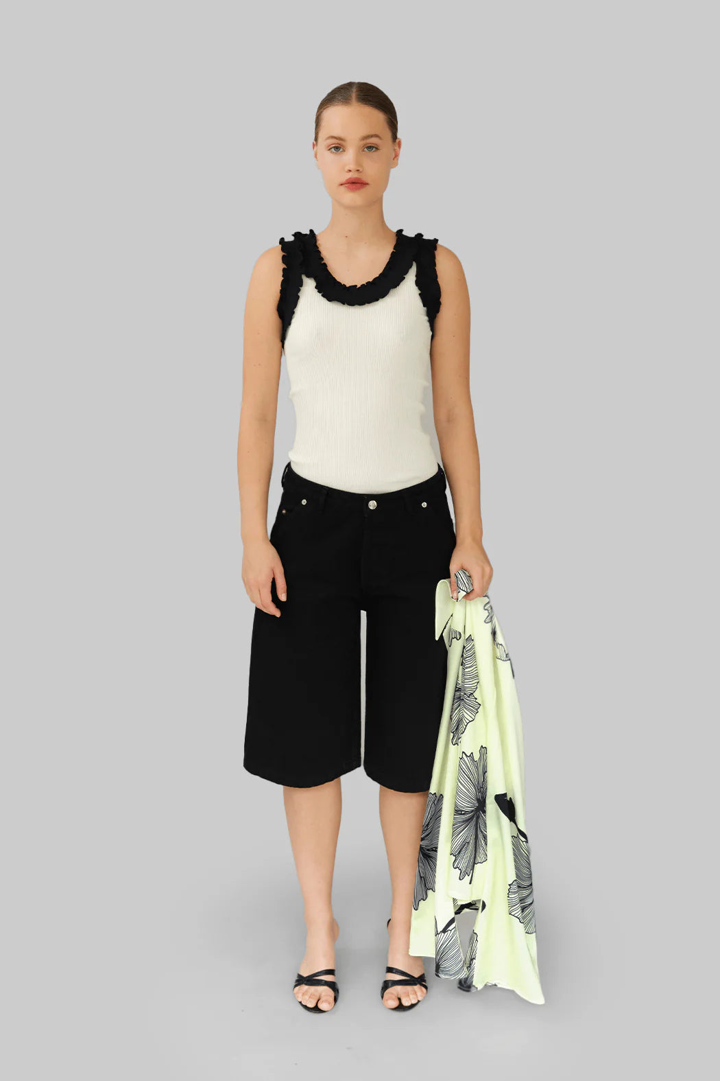 Model wearing OperaSPORT Mika Denim Shorts Black front view