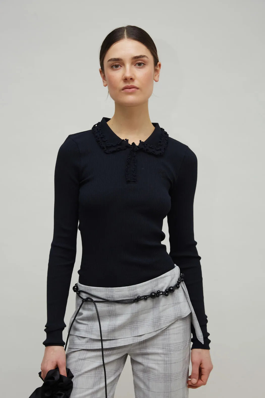 OpéraSPORT Arianna Seamless Polo in Black worn