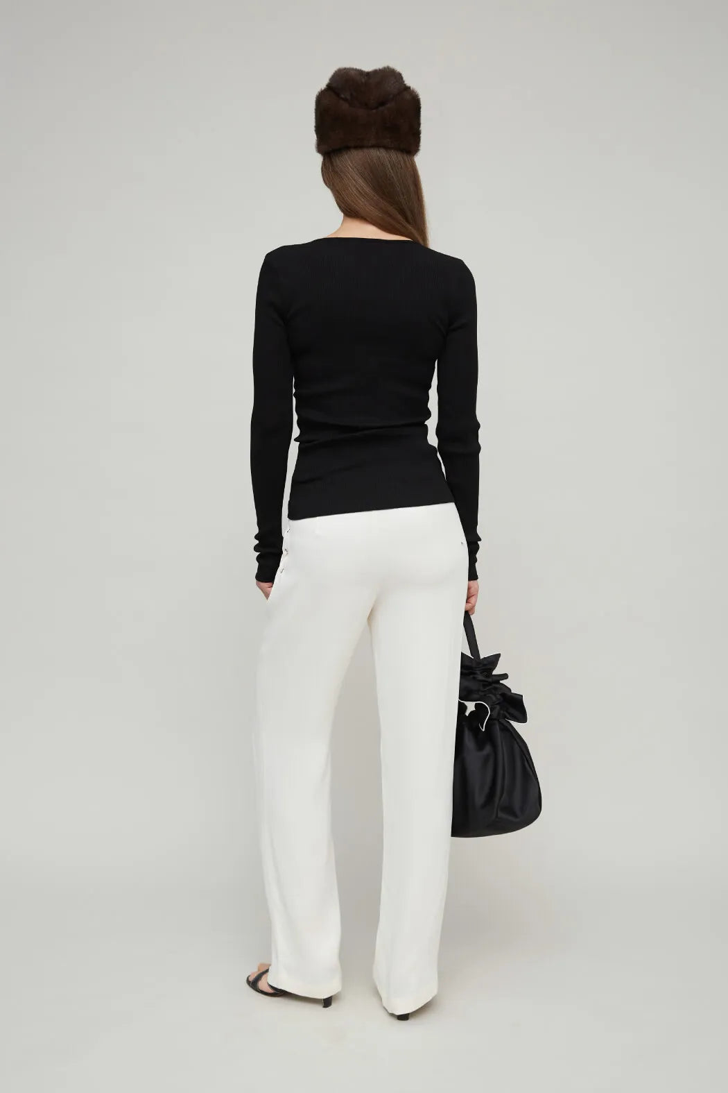 Back view of OpéraSPORT Claire Seamless Cardigan in Black worn