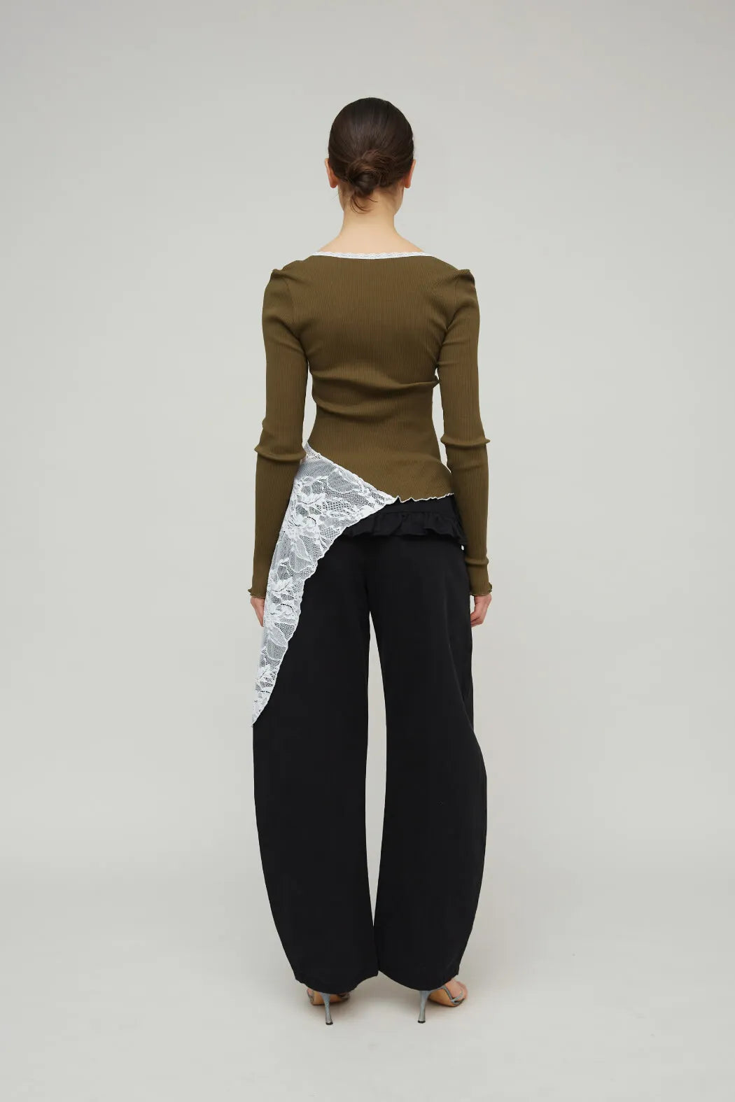 Back view of OpéraSPORT Constanza Seamless Top in Olive worn