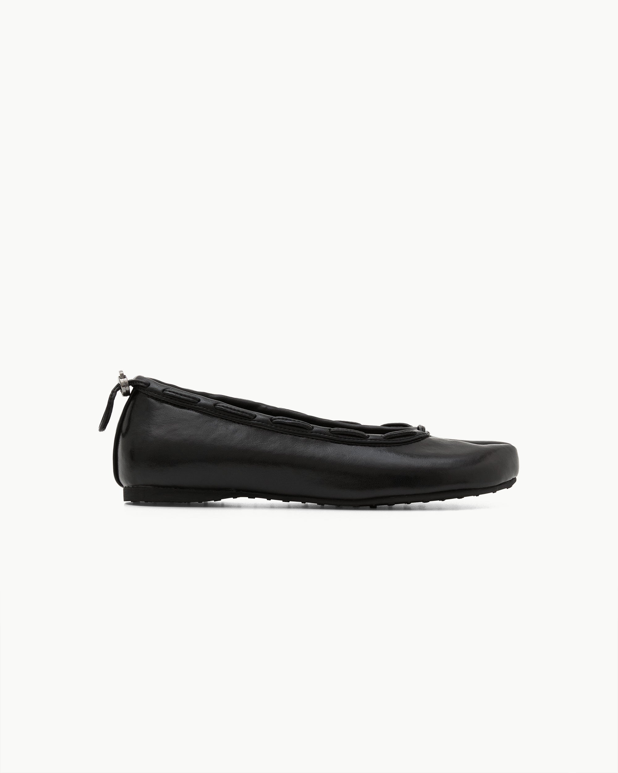 Side view of Paes Leather String Flat in Black