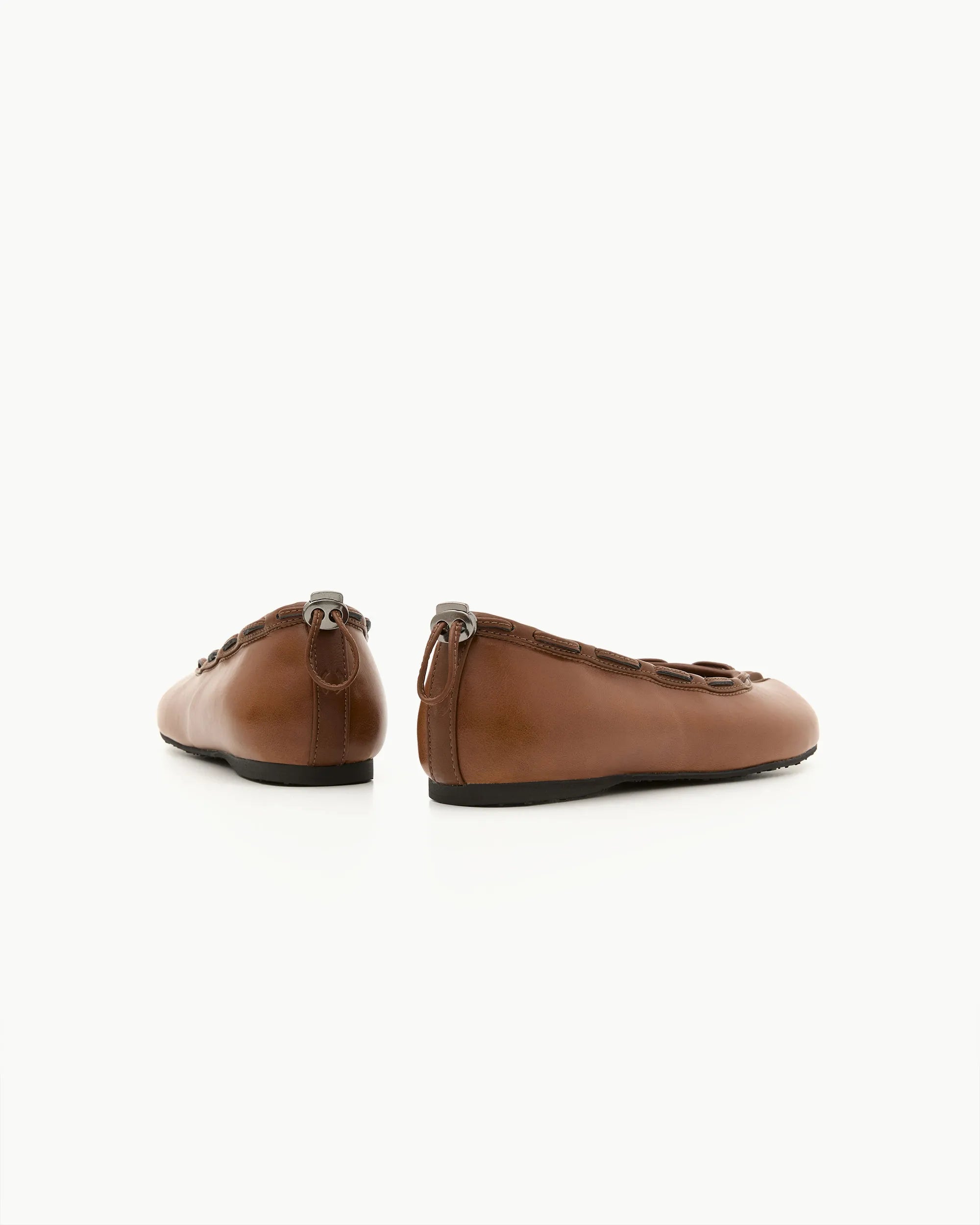 Front pair view PAES brown leather flat shoes clean design