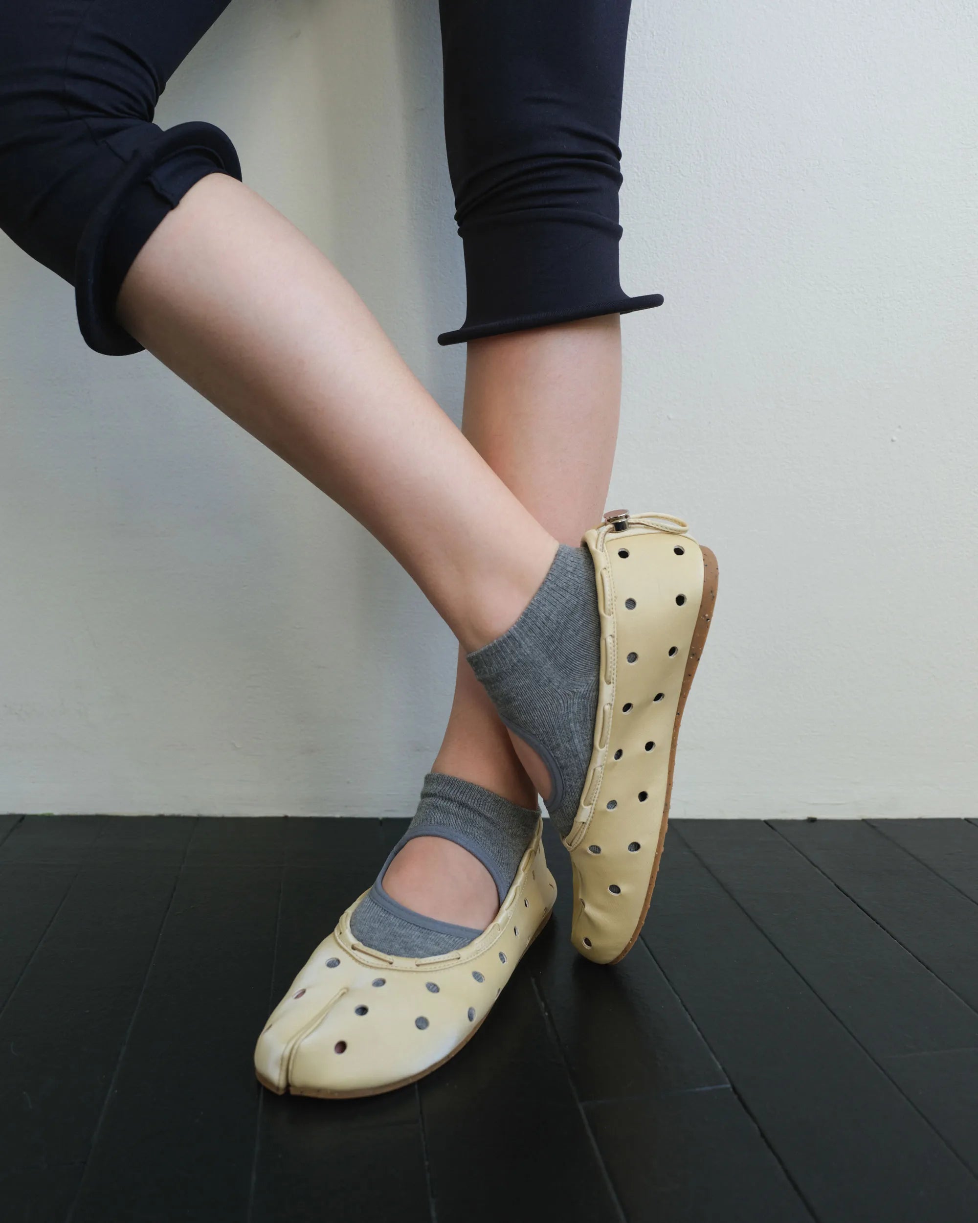 Model wearing PAES Leather String Flat in Cheese