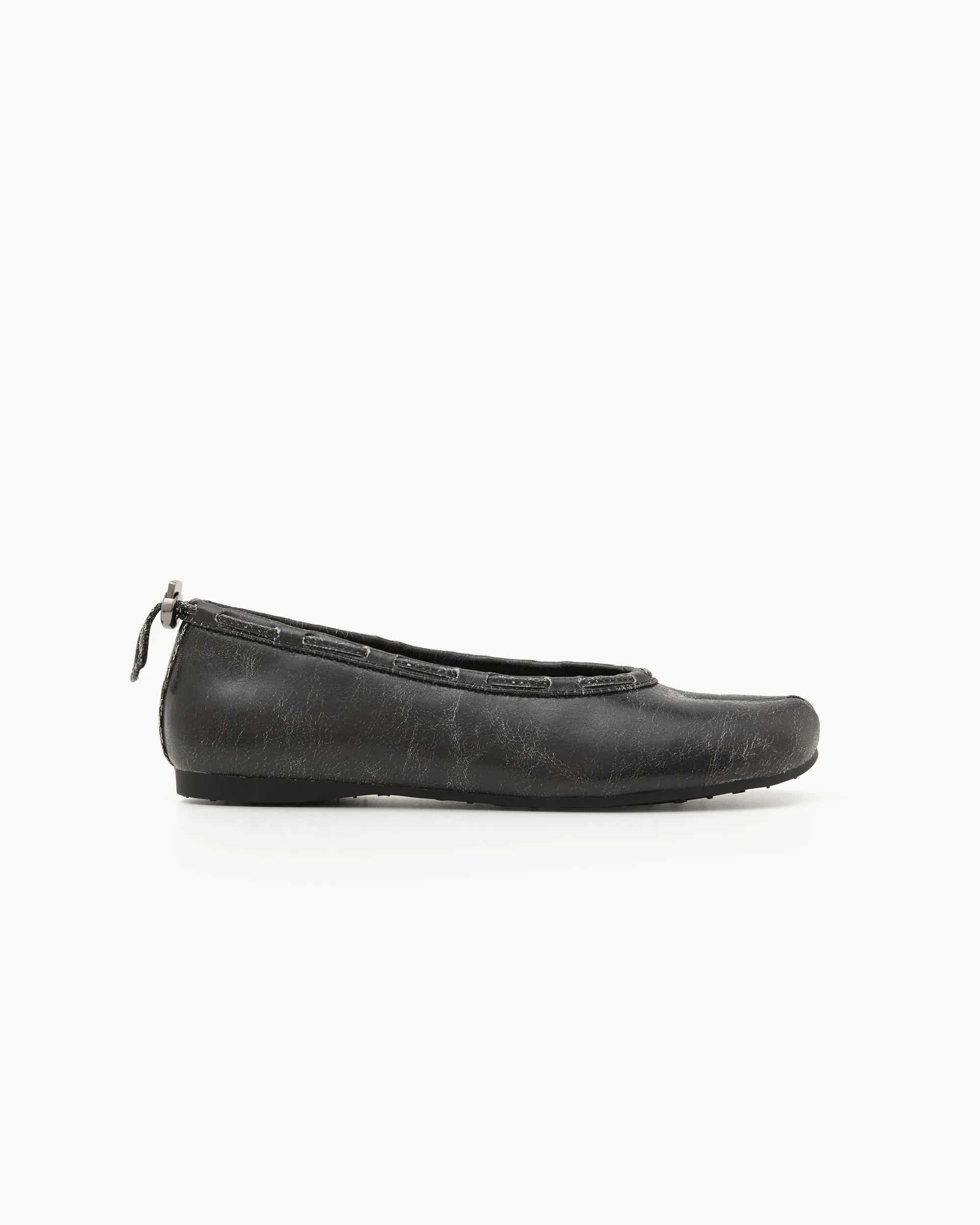 Side view of PAES Leather String Flat in Vintage Black