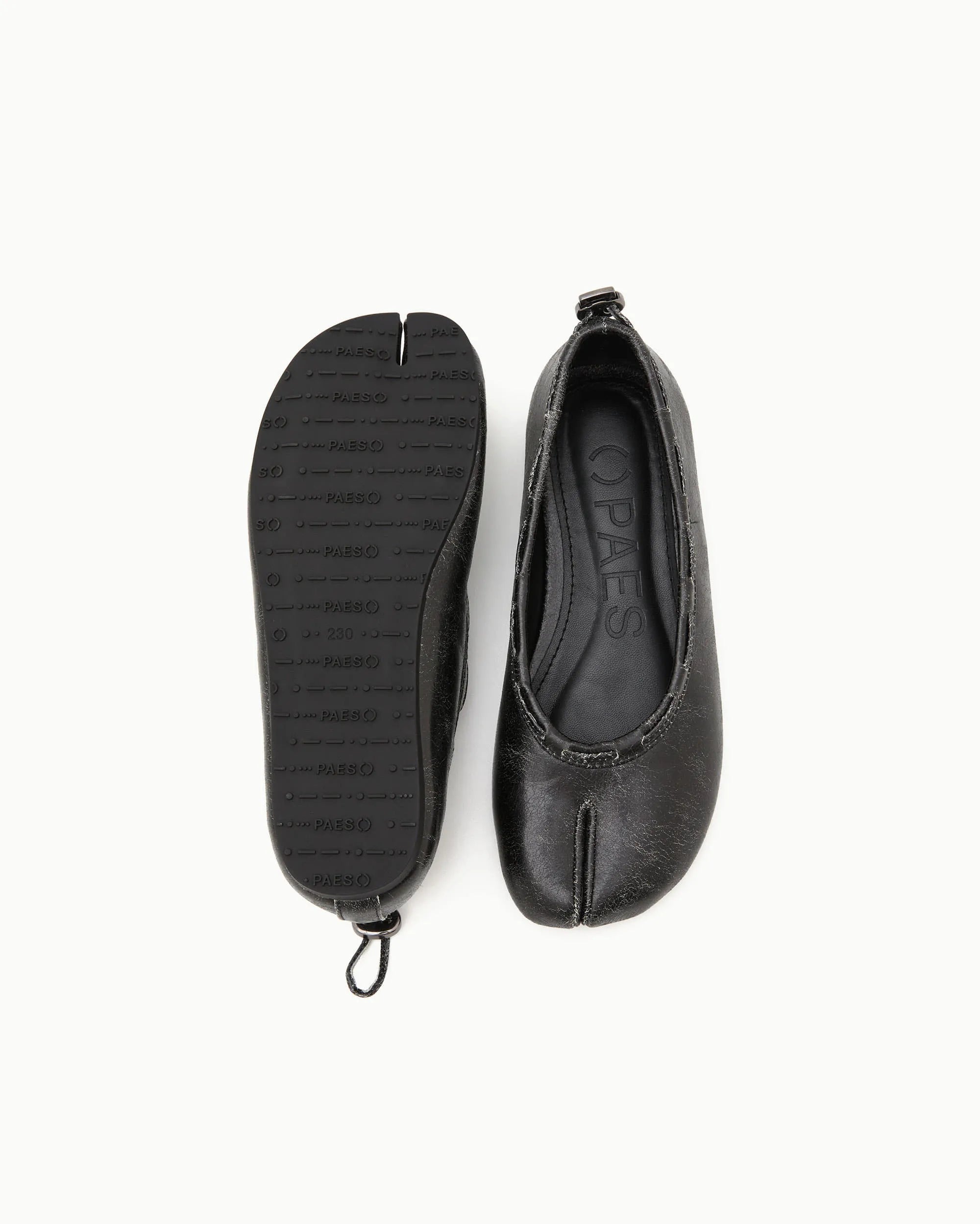 Sole detail of PAES Leather String Flat in Vintage Black