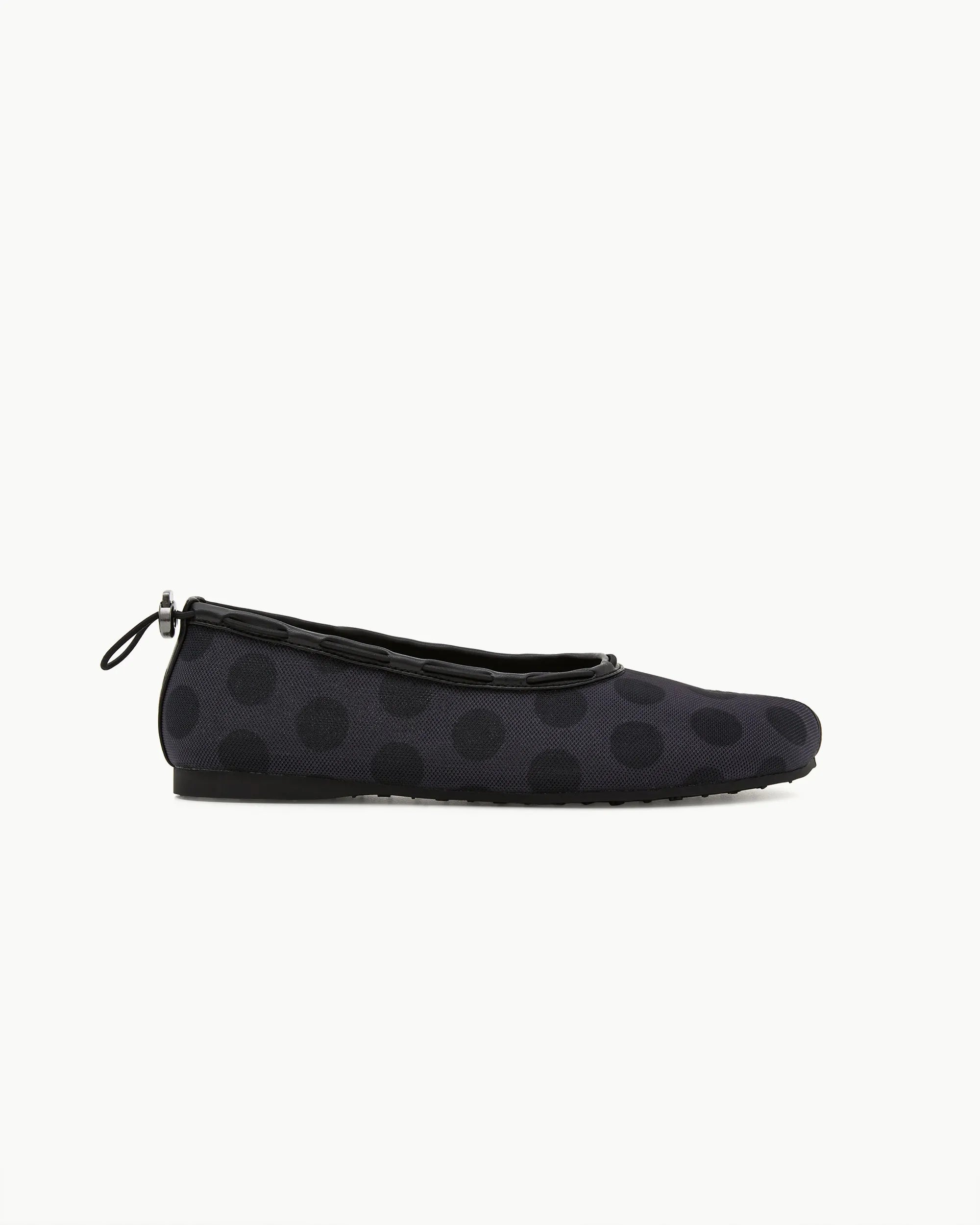 Profile view PAES dot black mesh flat shoes minimal design