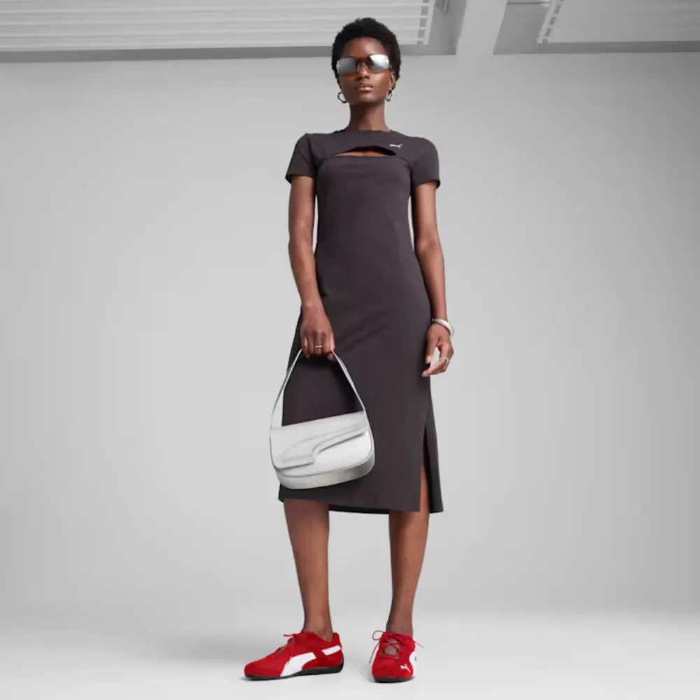 Model wearing PUMA Speedcat Go Wns All Time Red White