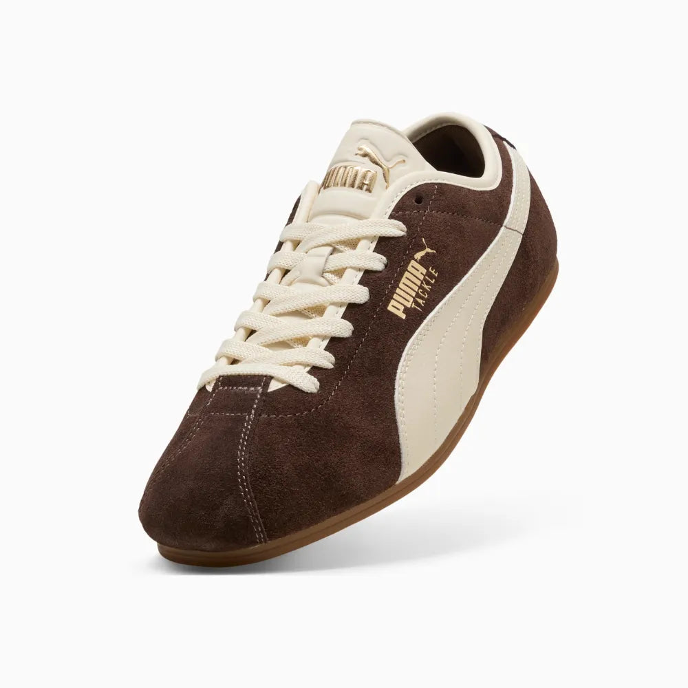 Angled view of PUMA Tackle Chocolate Alpine Snow Gum