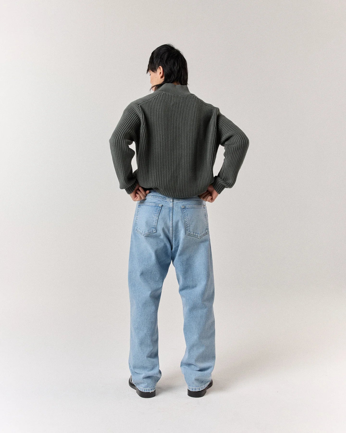 Back view of model wearing RONNING Classic Jeans in Vintage Blue
