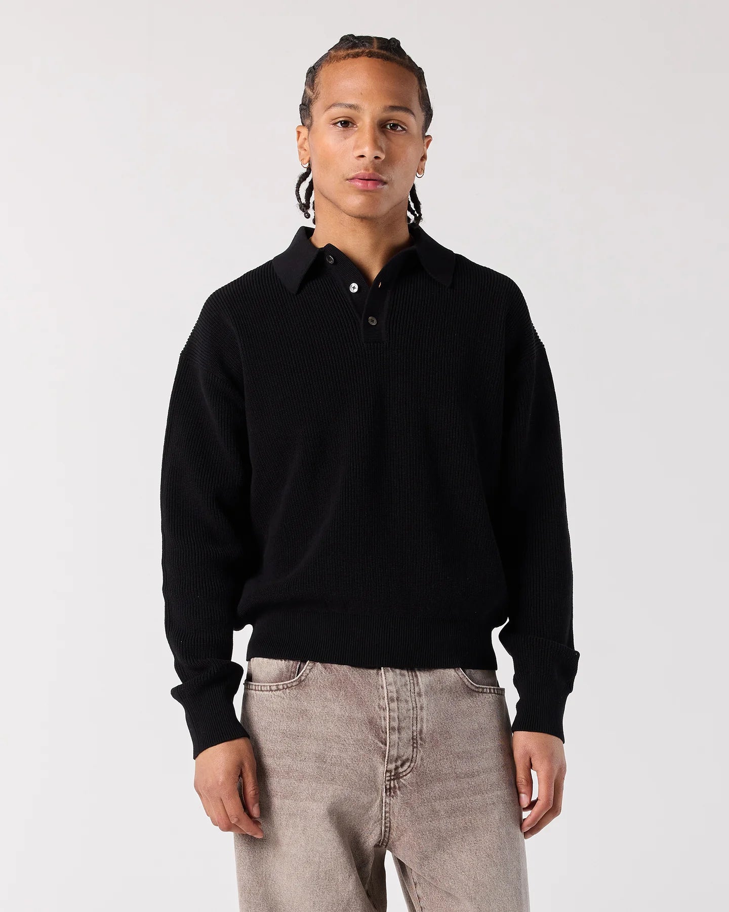 Model wearing RONNING Knit Polo Sweater in Black