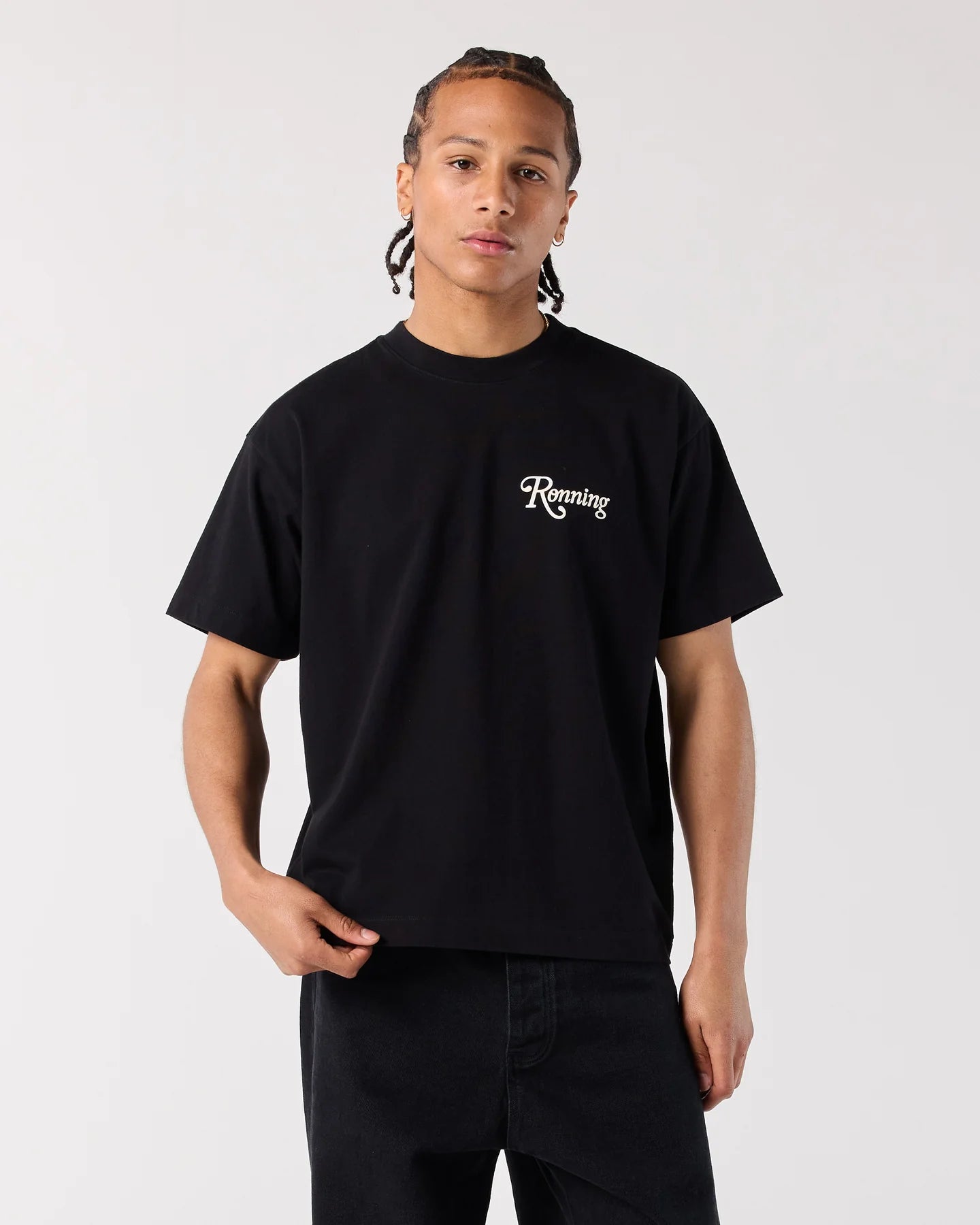 Model wearing RONNING Star Tee in Black