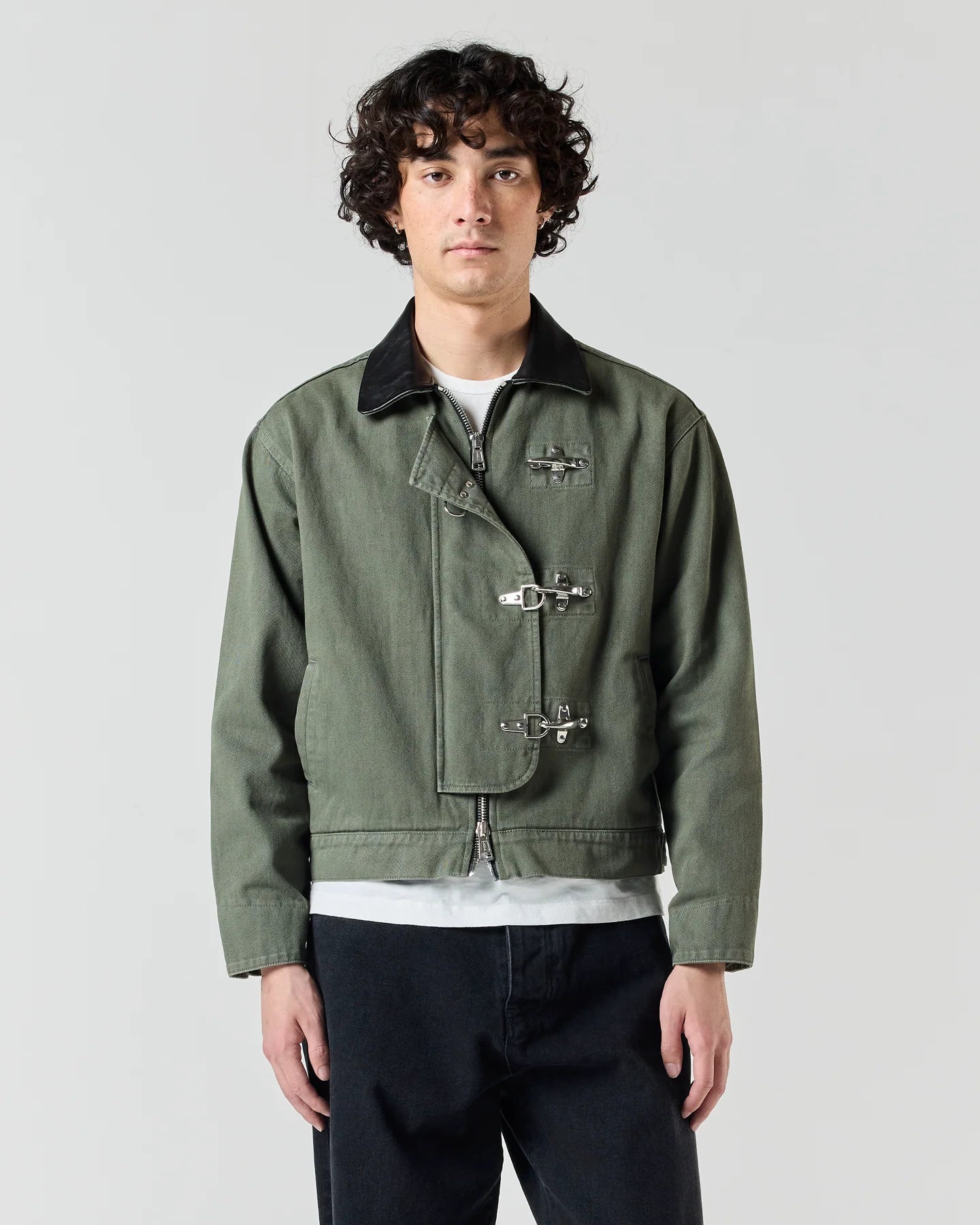 Model wearing RONNING Utility Fireman Jacket in Olive Green