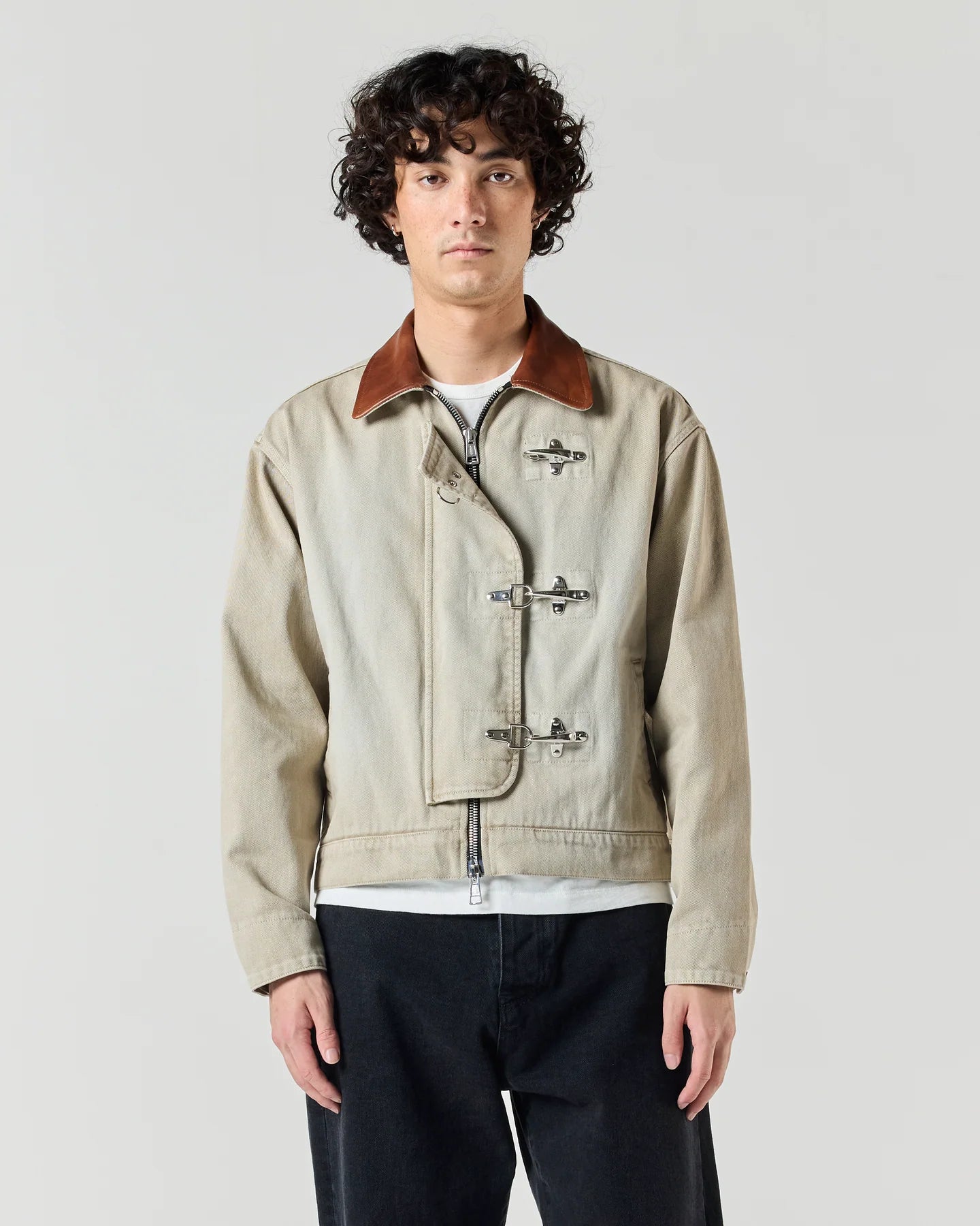 Model wearing RONNING Utility Fireman Jacket in Washed Sand