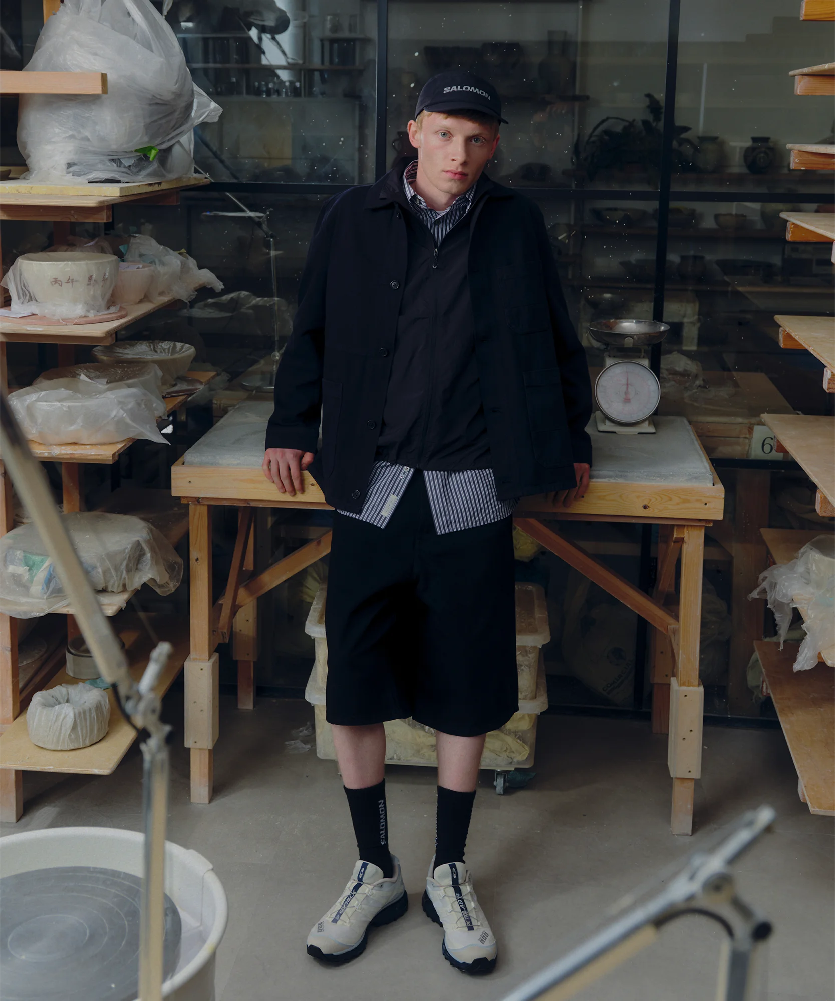 Model wearing Salomon XT-4 OG Pearl Blue Grisaille Vanilla Ice shoes