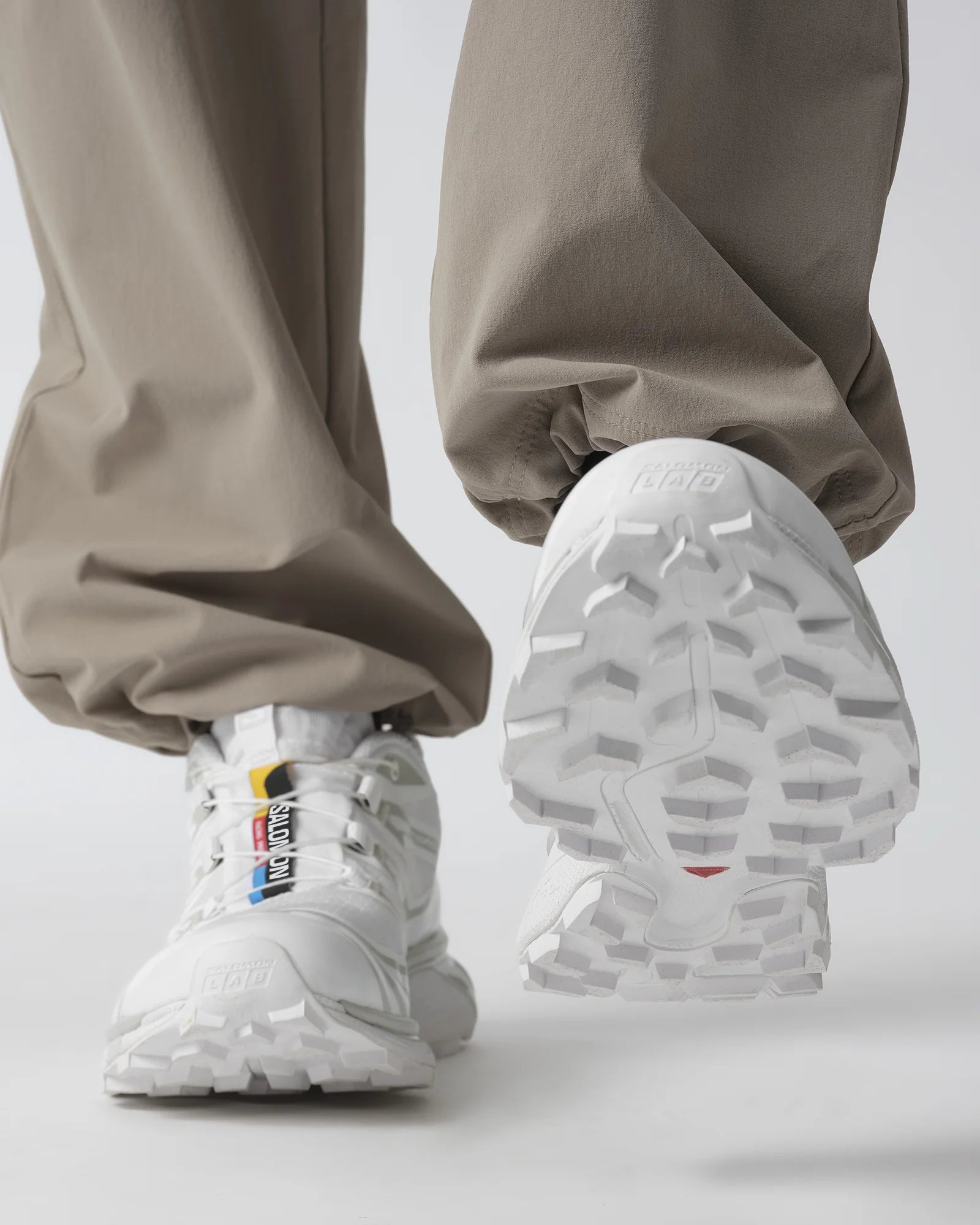 Model wearing Salomon XT-6 White White Lunar Rock