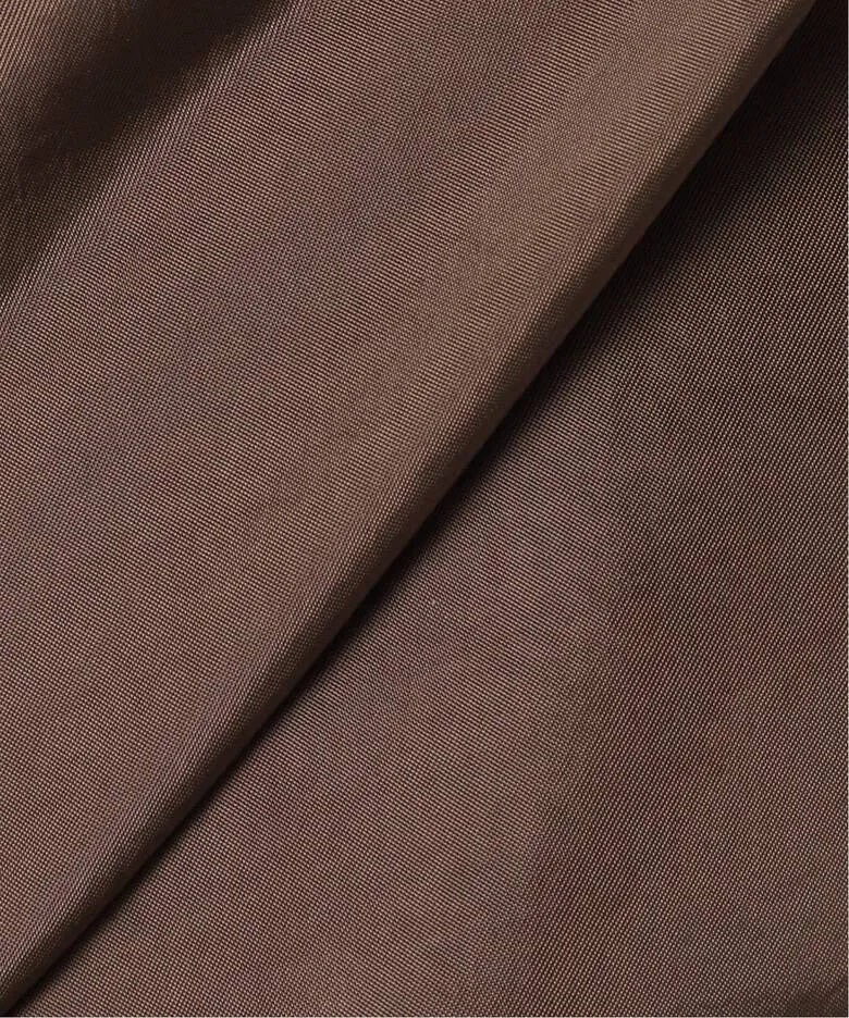 Fabric detail of Atelier Edition Sleeveless Flounce Blouse in Brown