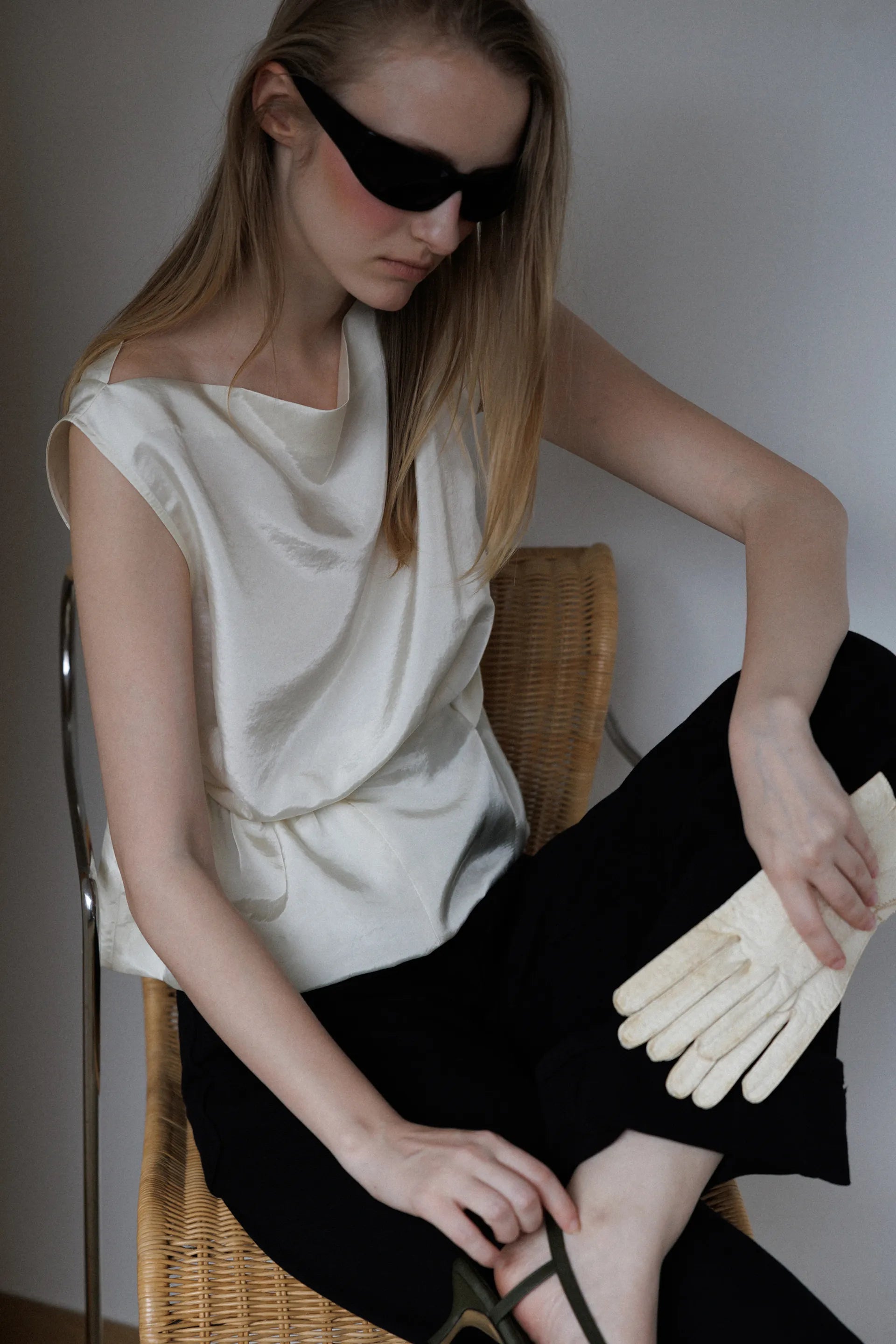 Atelier Edition Sleeveless Flounce Blouse in Cream waist flounce detail