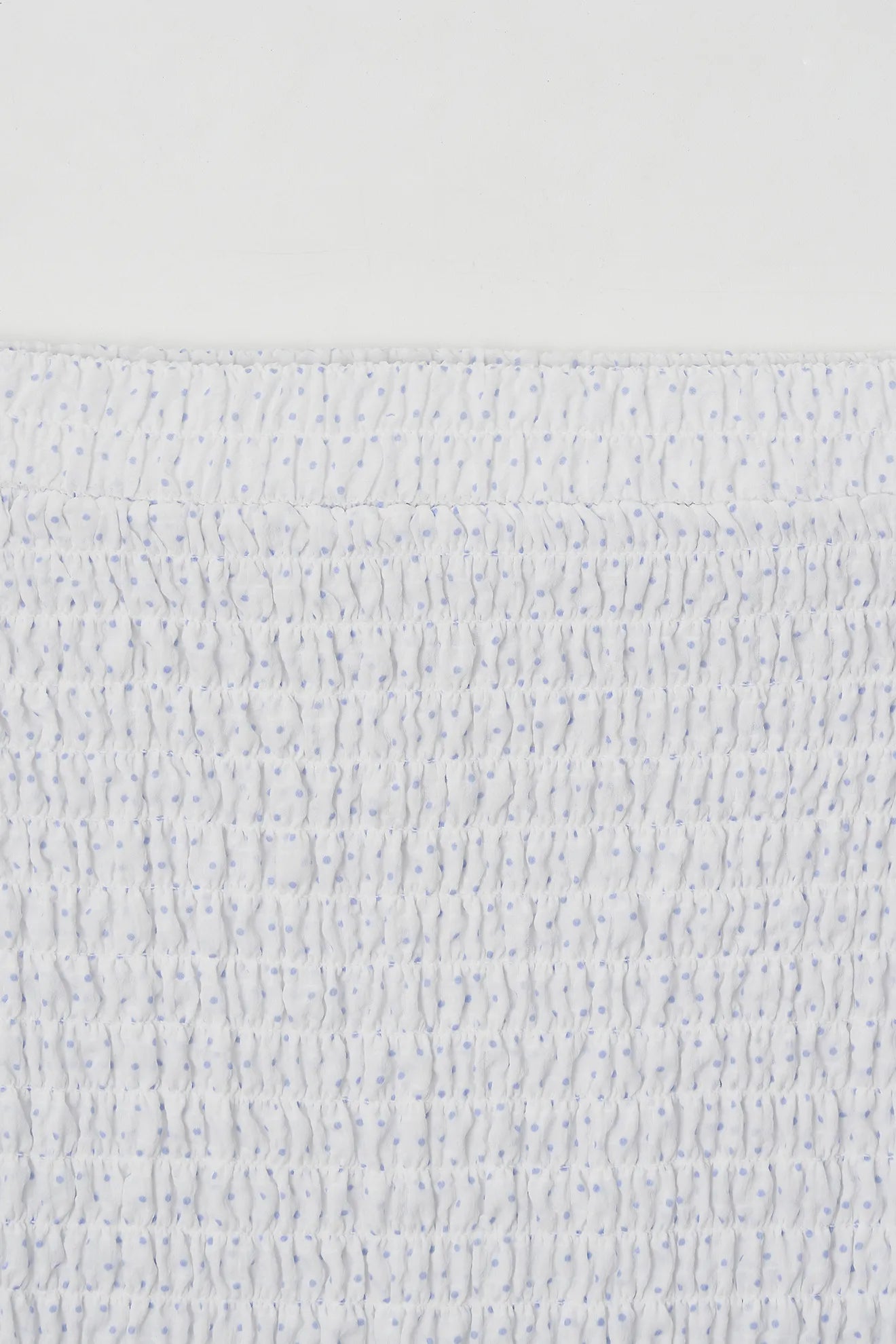 Smocked texture detail of Smocked Banding Skirt in White