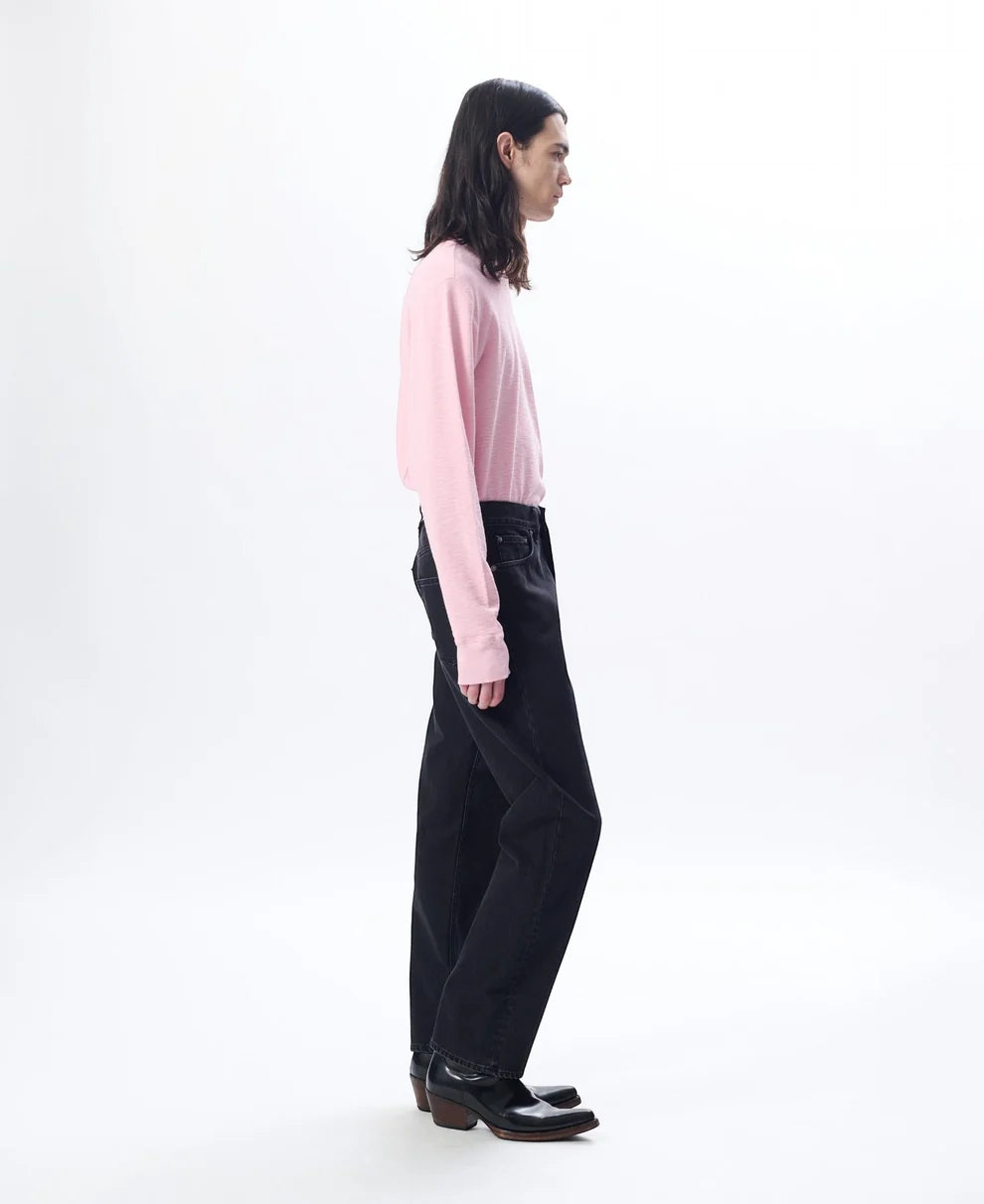 Side view of Sunflower Standard 708 Washed Black Jeans worn