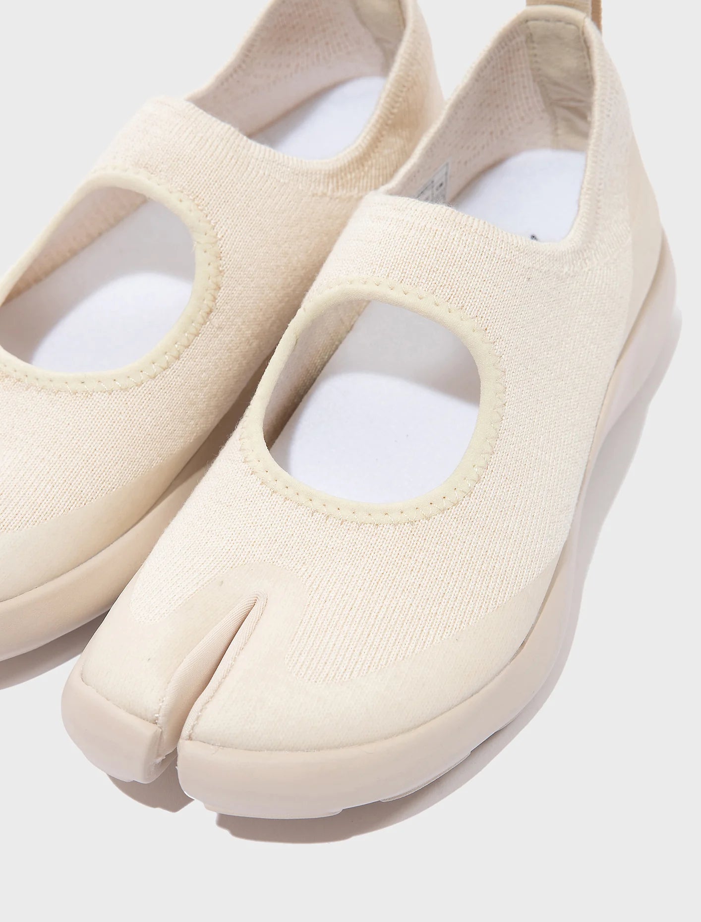 Tabi Sandal Off White by Tabi pair close up split toe minimalist design