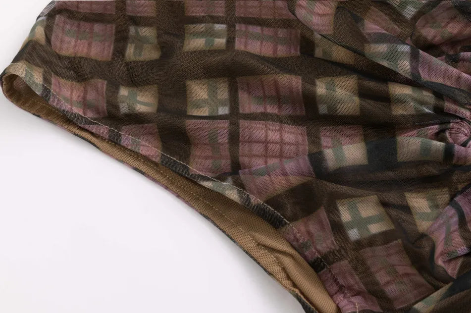 Hem detail of Taottao Plaid Mesh Star Cutout T-Shirt in Purple Plaid