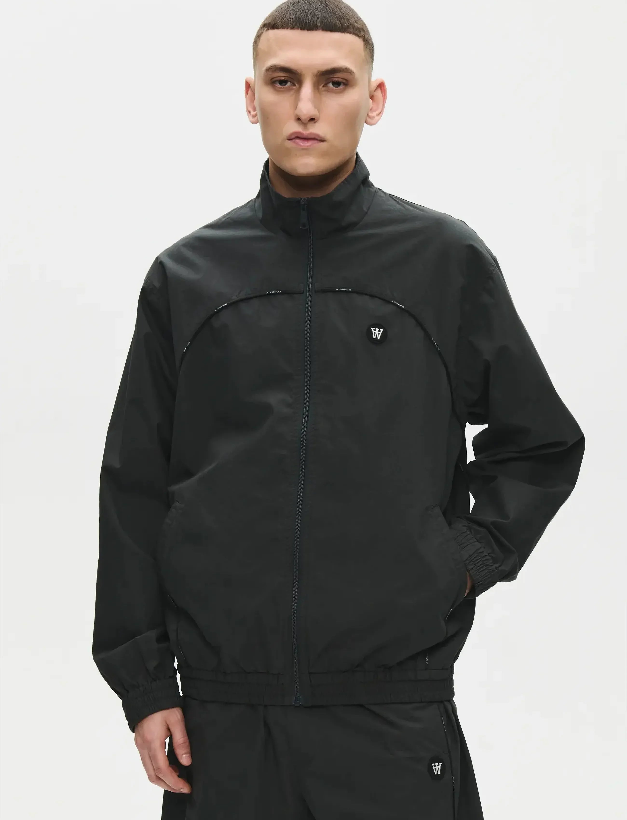 Model wearing Wood Wood Frankie X Jacket in Pirate Black