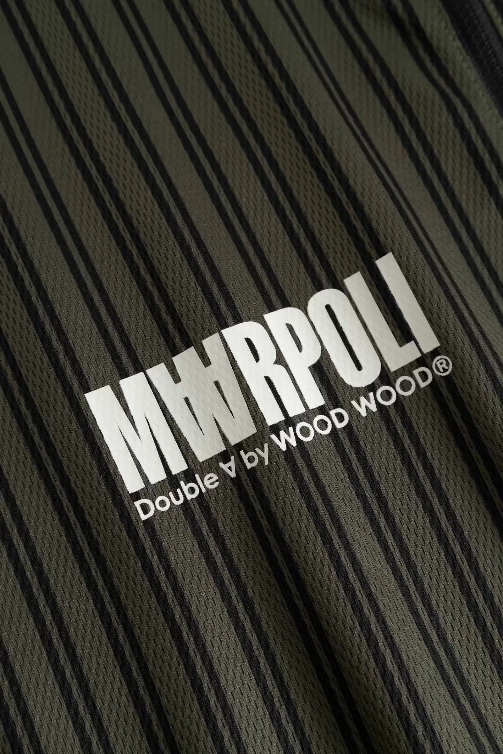 Wood Wood Lama Poloshirt Deep Depths Stripe Green logo detail