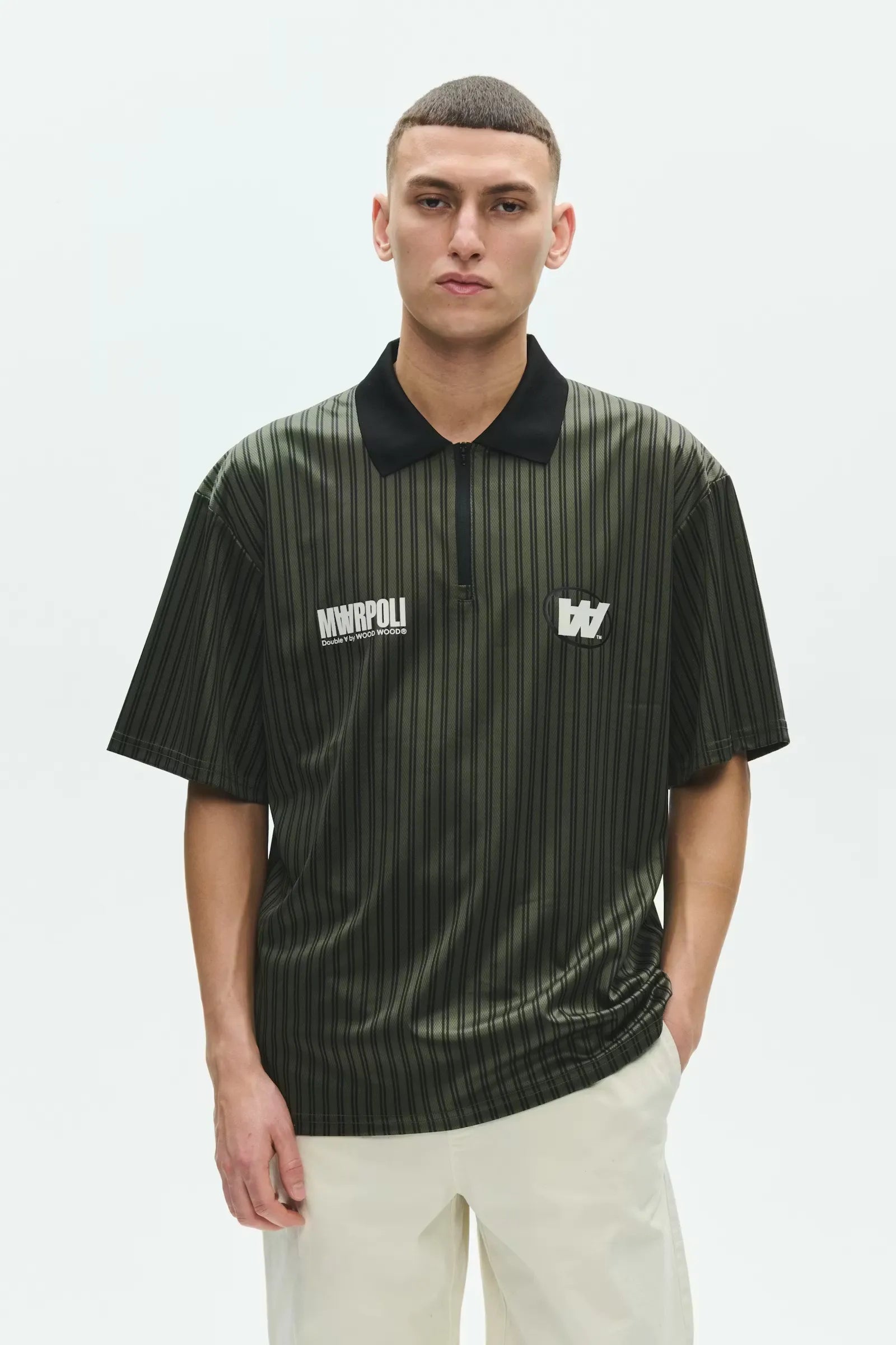 Wood Wood Lama Poloshirt Deep Depths Stripe Green worn by model