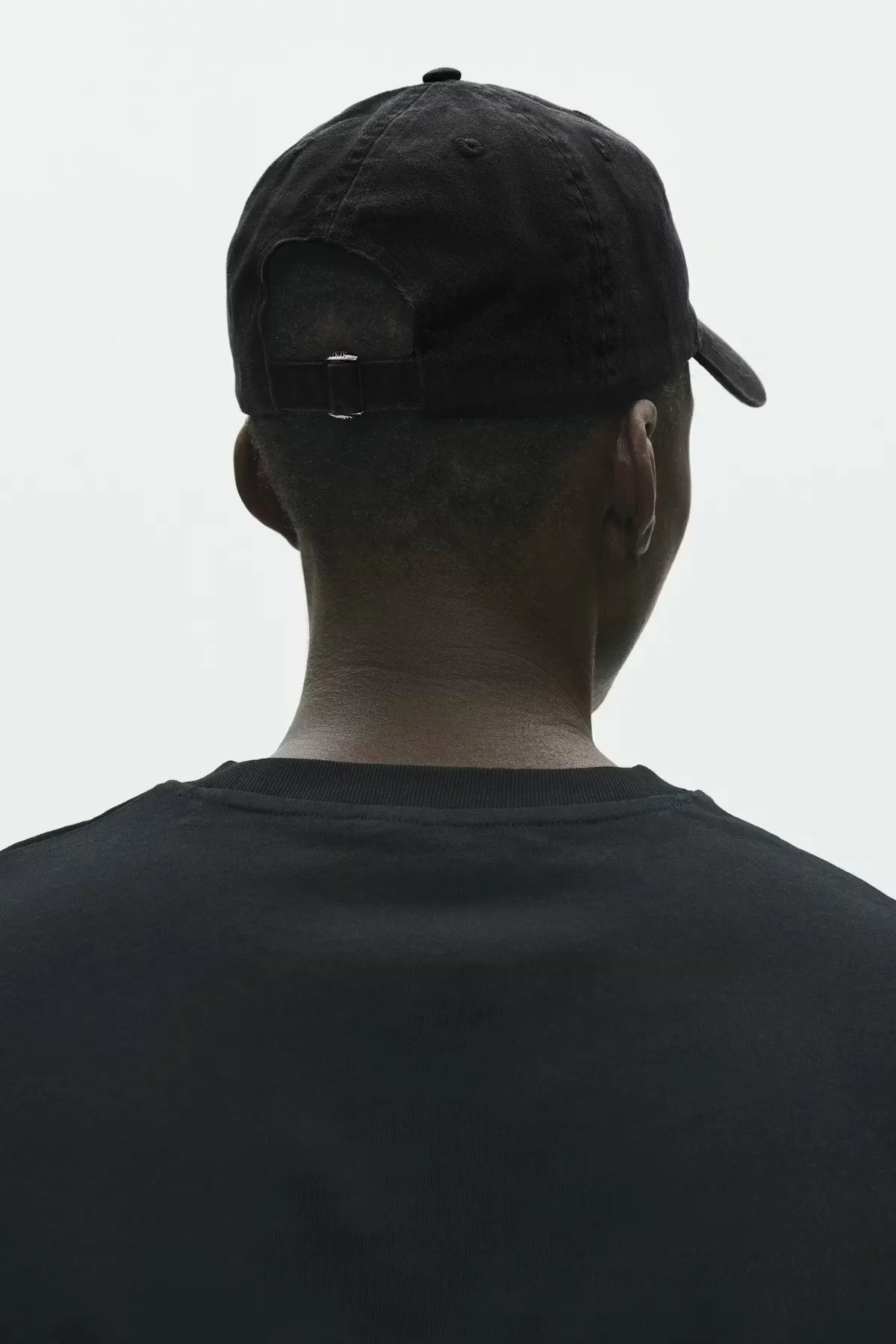 Back view of model wearing Wood Wood W.W. Cap