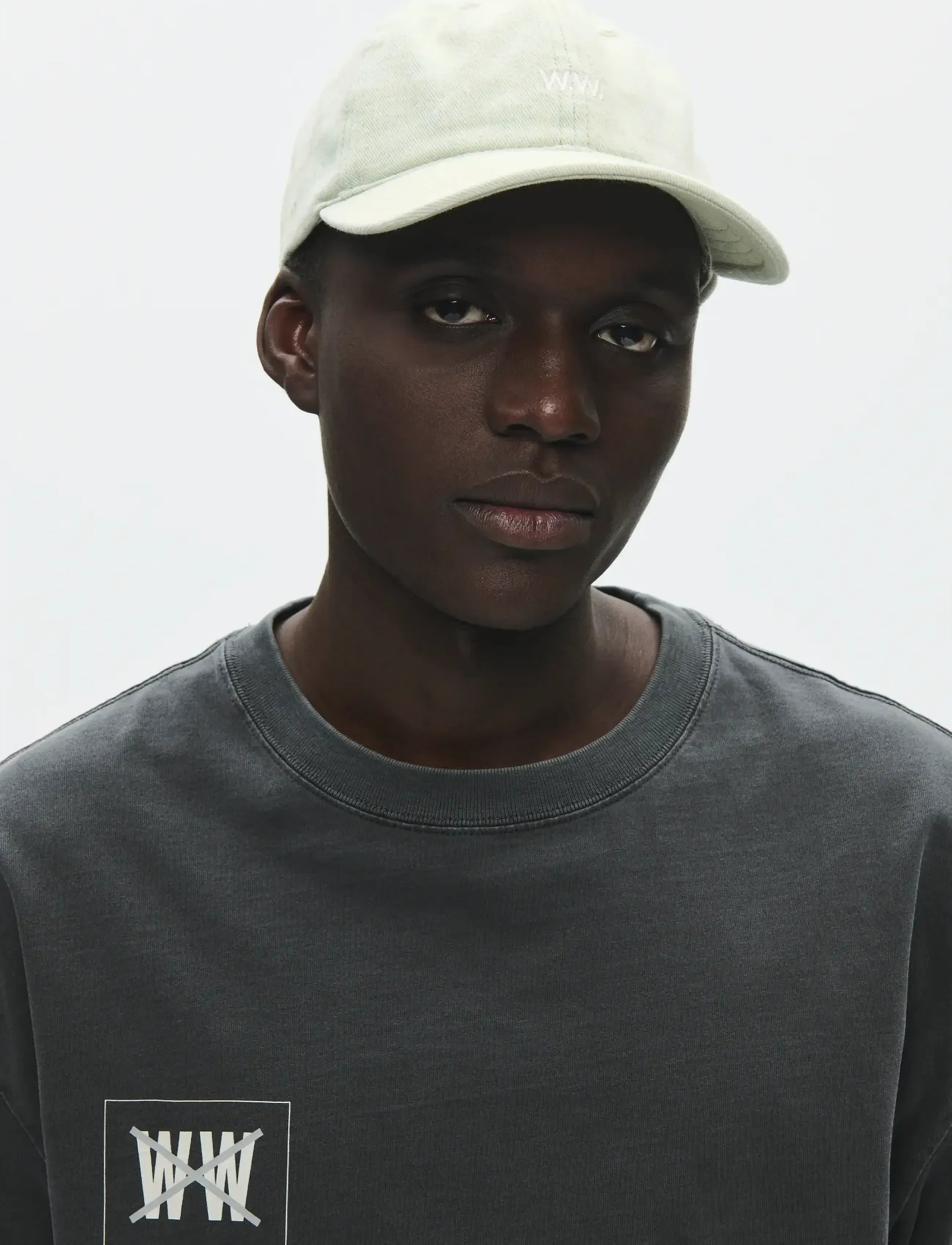 Front view of model wearing Wood Wood W.W. Cap in Light Blue Denim